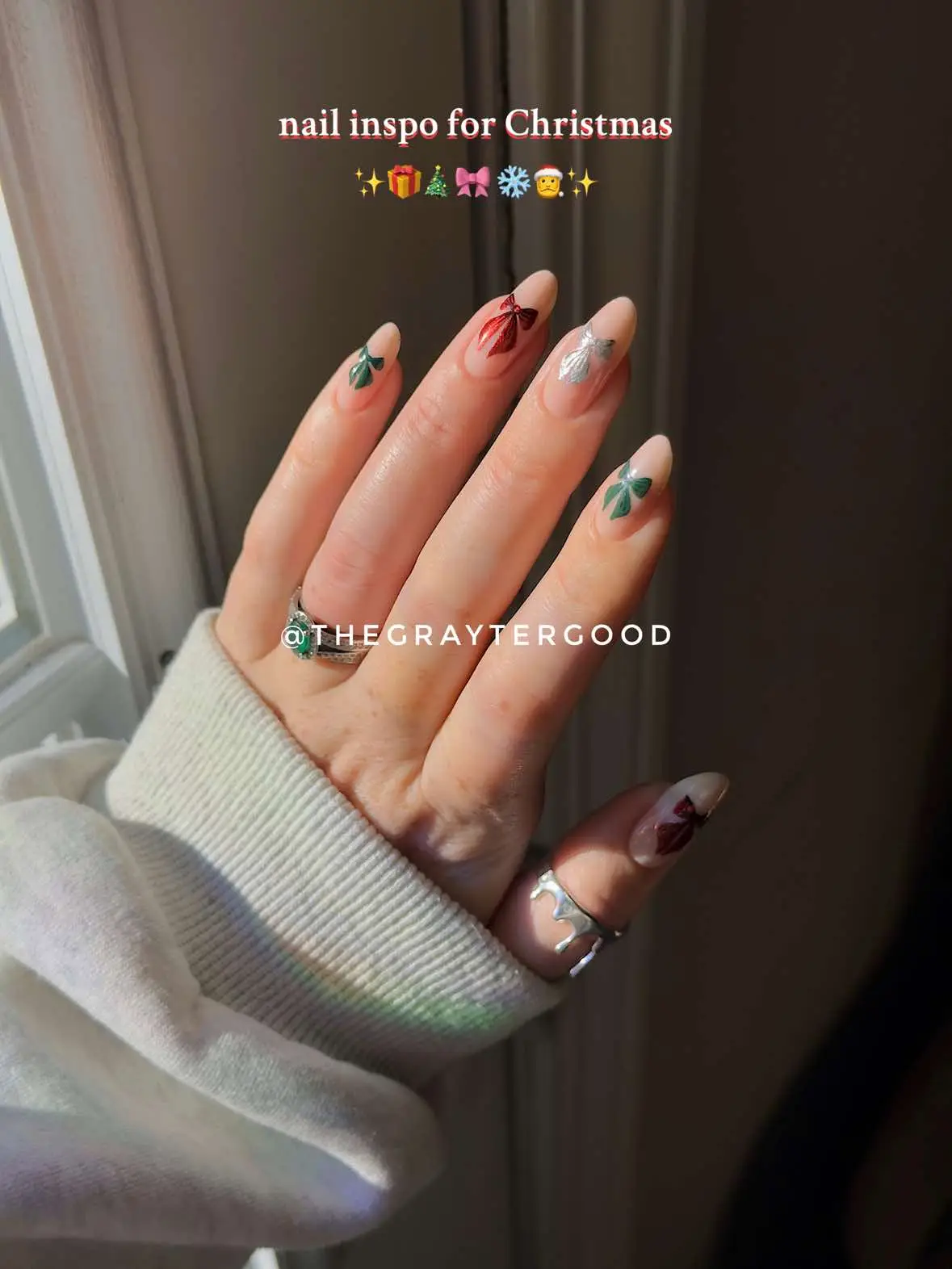 I usually do my nail art with regular polish, but used gel for the second manicure (the @rhode skin inspired red/gray one) because off the matte topcoat / acrylic powder trick for sweater nails. I also have a bow nail tutorial posted as well for details on how to draw and transfer these bows to your nails easily 💅🏻✨🫶🏻🎀 #nails #diynailsathome #gelnails #christmasnails #nailart #naildesigns #christmas2024 #nailinspo #nailtok #holidaynails #christmasnailart #bownails #nailart #beautyhack #inspo