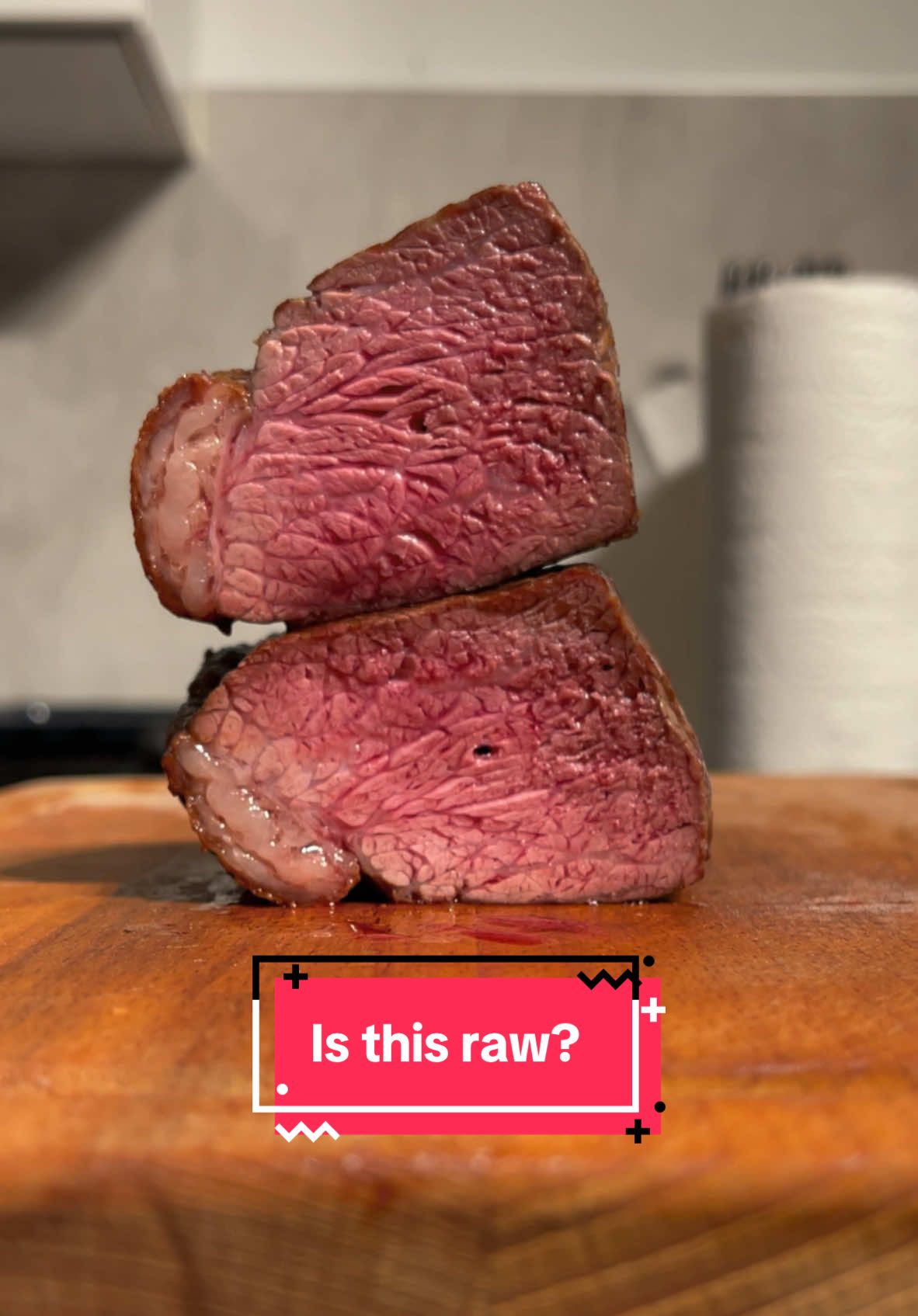 What kind of cut is this? Is this steak raw? What do you think? Reveal in part 2.  #FoodTok #EasyRecipe #cooktok #easyrecipesathome #fyp #foryoupage #juicy #steak #foodtiktok #australia #asmr #asmrfood #sharp #knife #wood #lens #boneless #pink #rare #medium #cap #raw #blood #myoglobin #fatcap #hole 