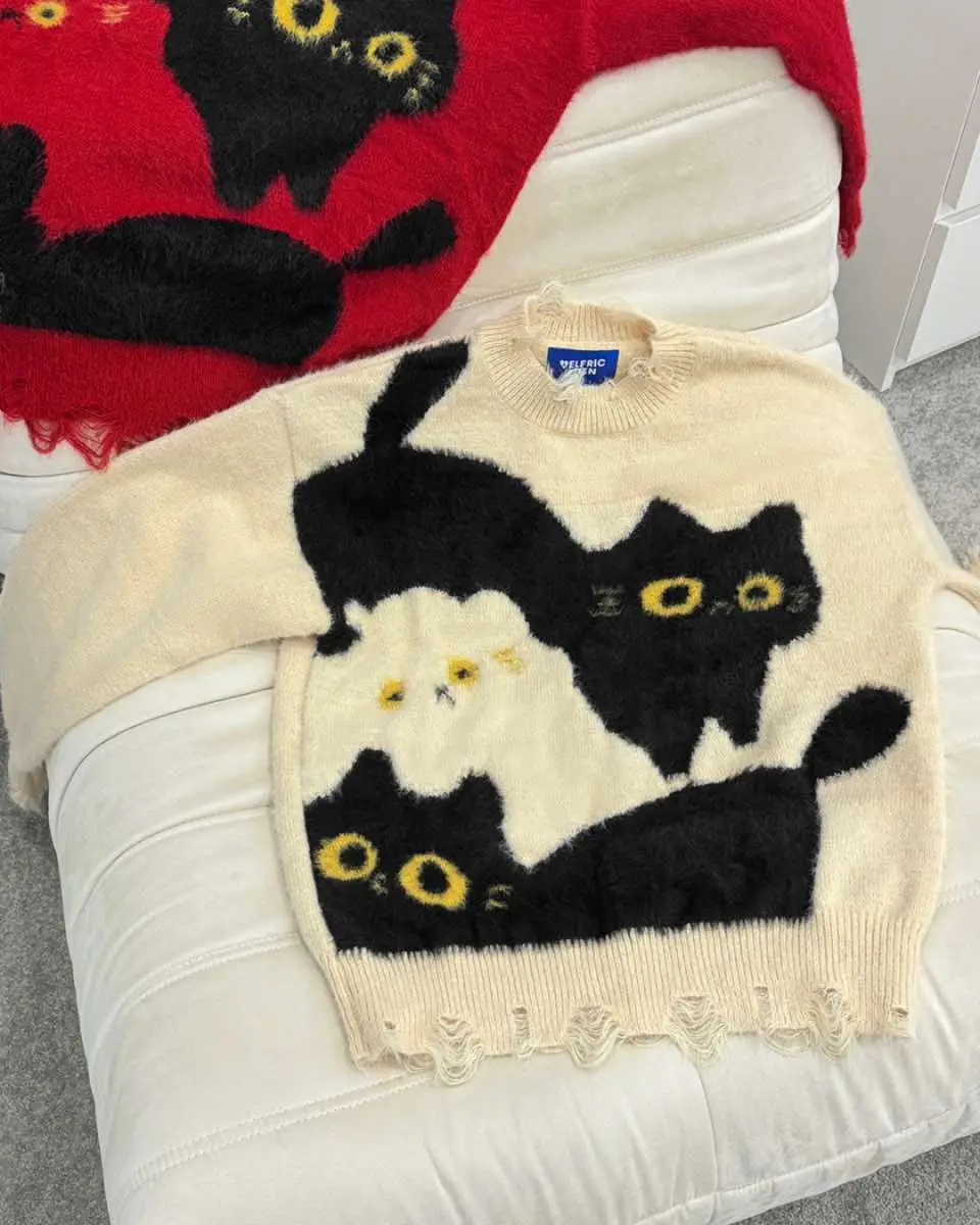 Bringing catitude to your wardrobe. 🐾😼 #aelfriceden #giftguide #sweater #cat #holiday #gift #wishlist #christmas #giftideas #catsweater #cattok 