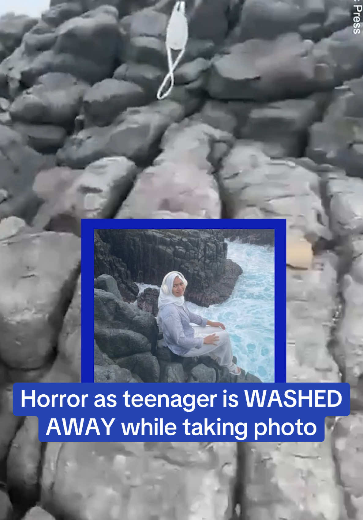 Merlin Septiana, 18, was tragically washed away to her death in Indonesia after she had arrived at a rocky beach in Central Lombok Regency to take photos with her friends. In the picture taken seconds before being struck, she was seen wearing headphones that may have blocked the noise of the waves. Footage shows frantic locals trying to rescue Merlin, desperately clinging onto a boulder, as the churning waters battered her. But Merlin soon slipped and disappeared under the foamy white torrent. Read the full story at DailyMail.com. #news #indonesia #waves 