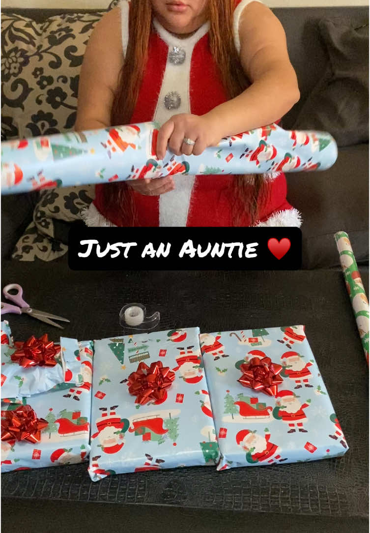 Just an Auntie in the Holidays ♥️ #auntie #holiday #christmas #presents #gift #auntlife #fyp #fypシ #mom #wrappinggifts #red #santaclaus #tree 