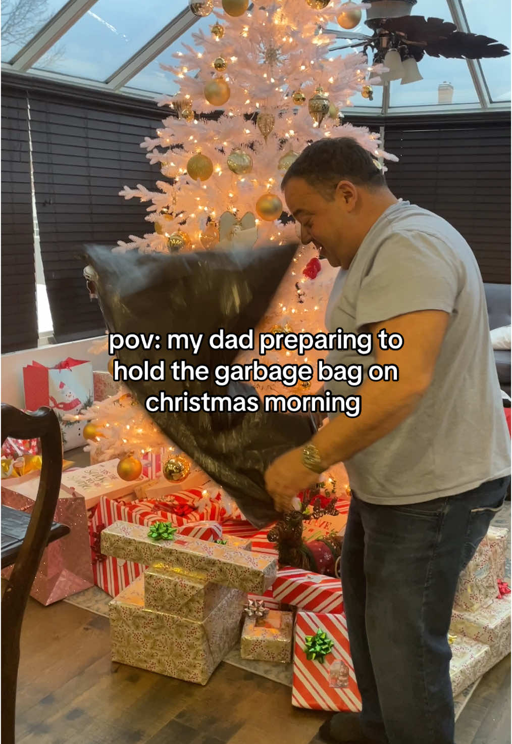 HAHA IM DYING can’t believe he agreed to film this #christmas #christmaseve #pregnant #gifts #wrappinggifts #wrapping #wrappingpaper #garbagebag #garbage #dad #father #morning #repost #relatable #viral #trendingvideo #trend #funny #family #honest #spoiled #rich #richkid #tradition 