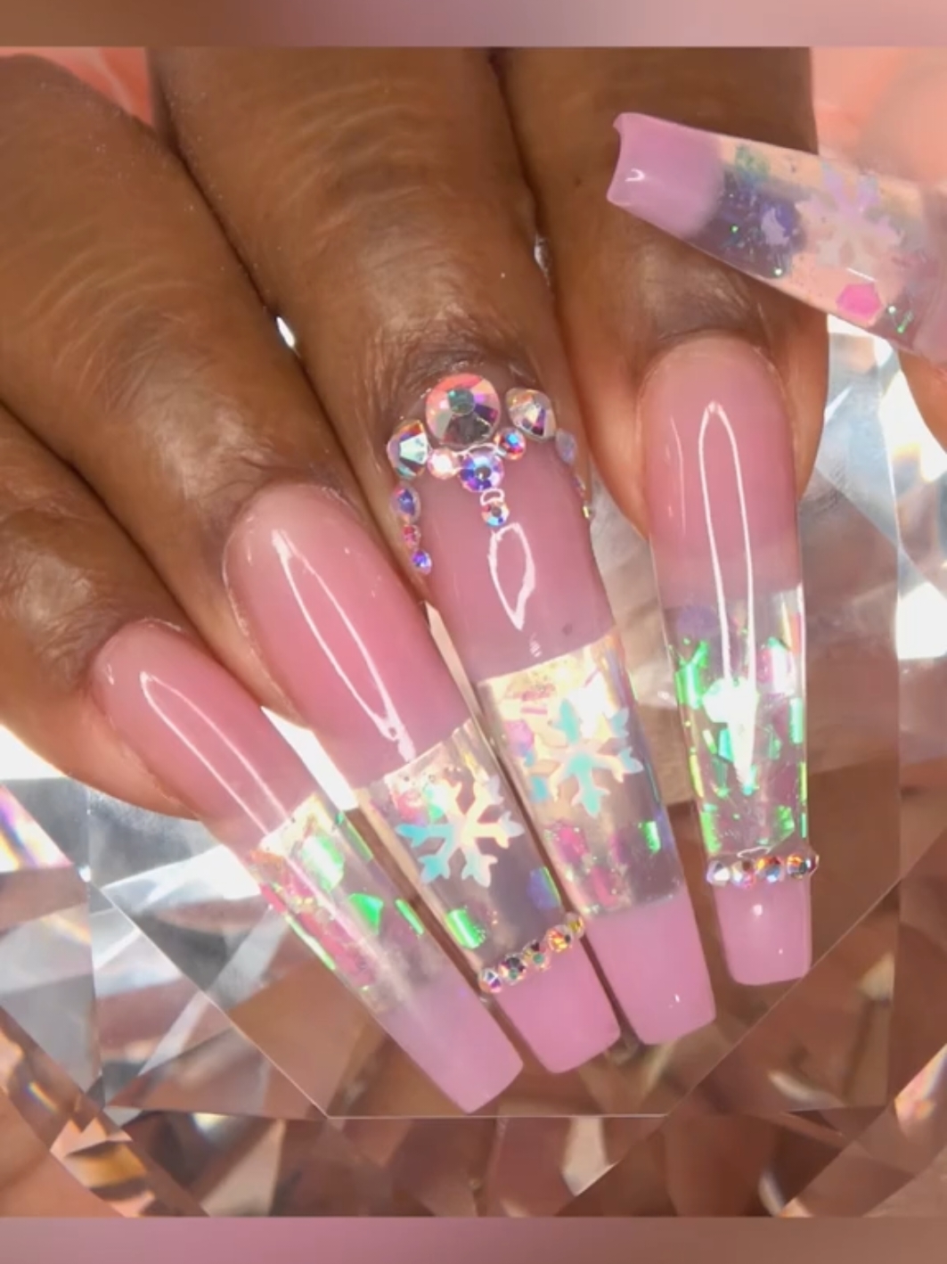 Who remembers these nails? I did these in 2019, and it still holds the spot of one of my all-time FAVORITE nail designs ❄️🩷💅🏾.