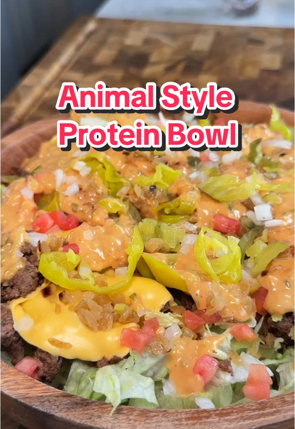 Save this for weight loss ‼️ High Protein, Lower-Calorie In-N-Out Animal Style Burger Bowl 🍔💪 (recipe 👇🏽) Macros per serving with 4 tbsp of sauce per serving (x2 servings): approx 529 calories |52g P | 6g C | 32g F Ingredients: Burger Sauce: 	•	1/3 cup light mayonnaise 🥄 	•	4 tbsp pickle relish, drained 🥒 	•	3 tbsp ketchup 🍅 	•	1 tsp honey 🍯 	•	1 tbsp grated white onion 🧅 	•	1 tbsp yellow mustard 🍯 	•	1 tbsp caramelized onions 🧅 	•	1/2 tsp salt 🧂 	•	Water (as needed to adjust thickness) 💧 Make the Sauce: Mix all sauce ingredients in a bowl until smooth. Adjust thickness with water as needed. Caramelized Onions: 	•	1 large onion, finely diced 🧅 	•	1/2 tbsp avocado oil 🥑 	•	1/4 tsp salt 🧂 	•	4 tbsp water 💧 For Caramelized onions: Heat avocado oil over medium heat, add diced onions and salt, cook for 15-20 minutes until golden, stirring occasionally, and deglaze the pan with water as needed to scrape up browned bits for richly flavored caramelized onions. Ground Beef: 	•	1 tbsp avocado oil 🥑 	•	1 pound 93% lean ground beef 🥩 	•	3/4 tsp salt 🧂 	•	1/4 tsp black pepper 🌑 	•	2 tbsp Worcestershire sauce 🥄 	•	1/4 cup beef broth 🥣 	•	3 slices Velveeta cheese 🧀 For the beef: Preheat a pan on medium-high for 3 minutes, add oil, then place beef in pan, ensuring full contact. Let it sear undisturbed for 3 minutes to develop a golden crust. Season with salt and pepper, flip, then break apart the beef. Add beef broth and Worcestershire sauce. Top with cheese slices, allowing them to melt over the beef without stirring. Veggies: 	•	4 to 5 cups shredded iceberg lettuce 🥬 	•	1/4 cup white onion, finely diced 🧅 	•	1/4 cup dill pickle slices 🥒 	•	1/4 cup pepperoncinis, chopped 	•	1/4 cup finely diced tomatoes 🍅 Assemble Bowl: Layer lettuce, onions, pickles, pepperoncinis, and tomatoes. Top with beef and drizzle generously with burger sauce. 🎄🎁 CHRISTMAS SALE ALERT! 🎁🎄 My DIGITAL COOKBOOKS are almost 50% OFF for a limited time! 🚨 Perfect for gifting or treating yourself! 🍽️✨ Comment “cookbook” below for the purchase link! Hurry, grab yours before the sale ends! 🏃‍♂️💨 . . . . #icekarim #healthyrecipes #EasyRecipes #mealprep #quickrecipes 