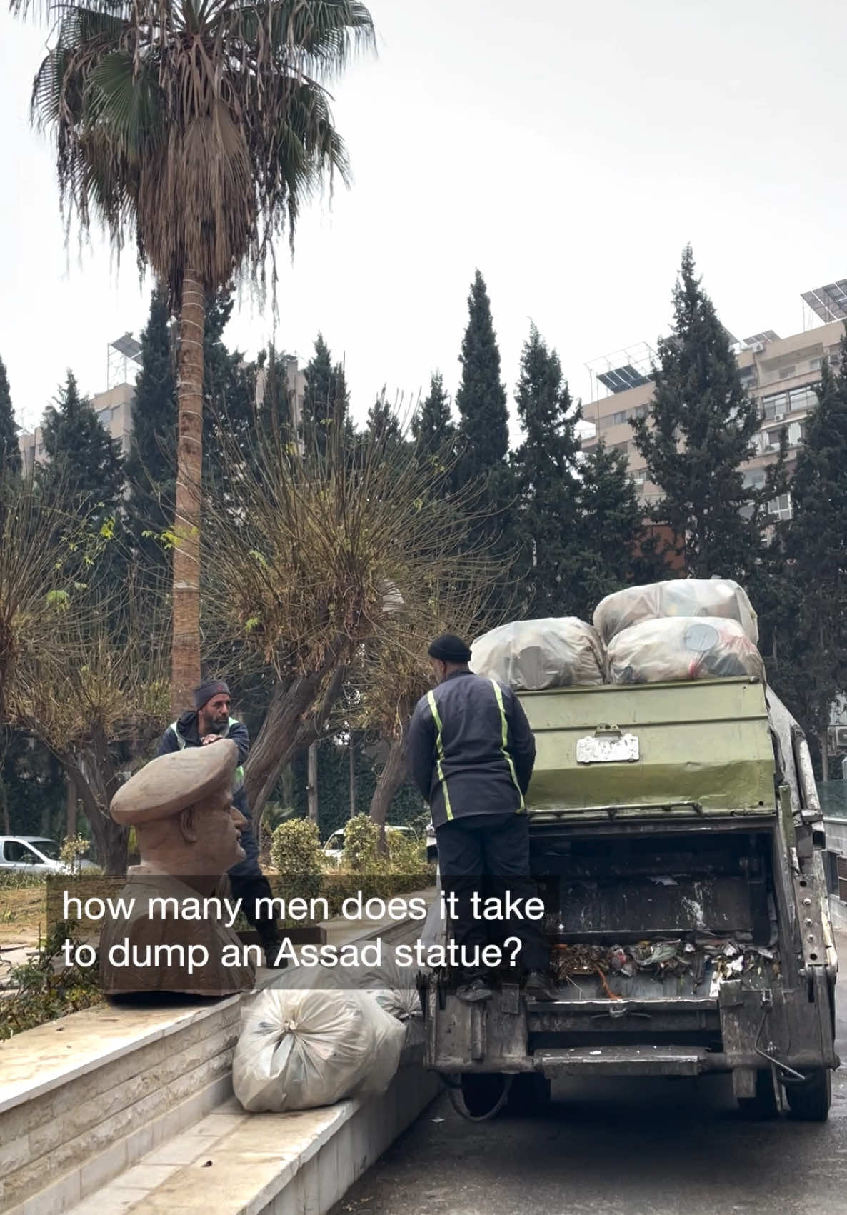 Garbage men removed a statue of former Syrian president Hafez al-Assad, which had been lying in a Damascus park for days following the fall of the Assad regime. #NPR #syria 