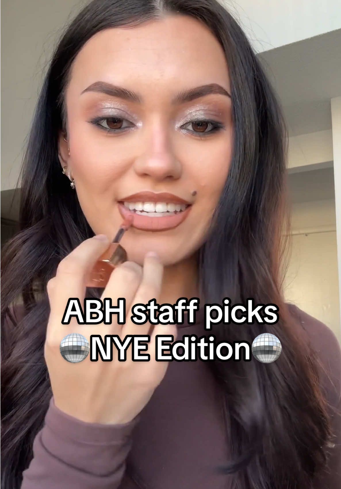 ABH Staff Picks featuring @Margie Zank! ✨ Her go-to NYE look is effortless but delivers major impact. 💥 Here are her faves to nail it: 🤎 Mini Spice Palette: for the perfect grungy smokey eye 🖤 Darkside Waterproof Gel Liner: for that sultry, slept-in vibe 🩵 Mini Sugar Palette: to make your inner corners pop ✨ 💋 Lip Velvet in Softy: long-lasting for when the clock strikes midnight ⏰ 💎 Stick Blush in Pink Diamond: to start 2025 absolutely beaming! 🌟 #AnastasiaBeverlyHills #newyearsmakeup #newyears #lipcombo #eyeshadowtutorial #makeuptok #glowing 