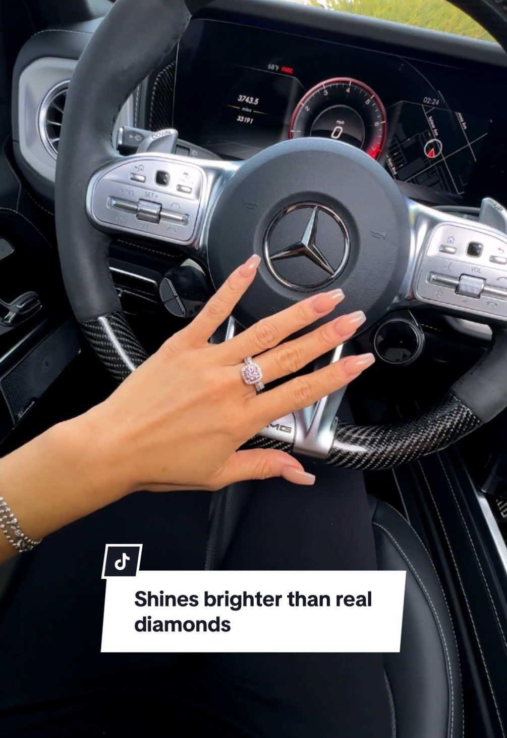 Shine brighter than real diamonds 💍 for a fraction of the cost. Beautiful and non tarnish.  *gifted affiliate collaboration  #moisannitejewelry #moissanitering #moissanitevsdiamond #mercedesbenzsteeringwheel #luxurycars 