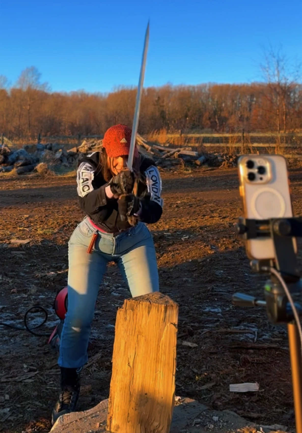 Splitting wood with a sword 🗡️ #choppingwood #creatorsearchinsights #woodasmr #asmr 