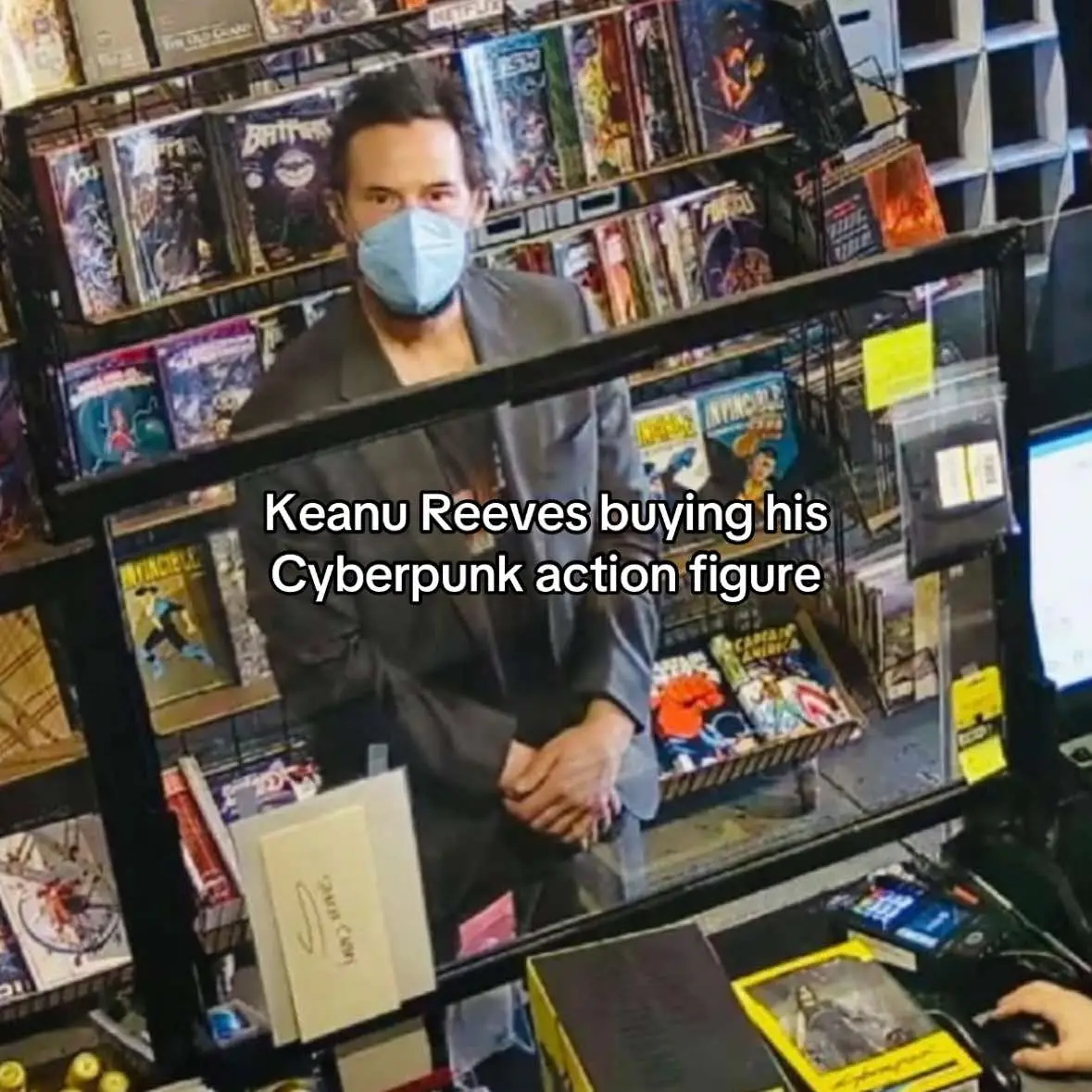 Keanu Reeves buying his Cyberpunk action figure