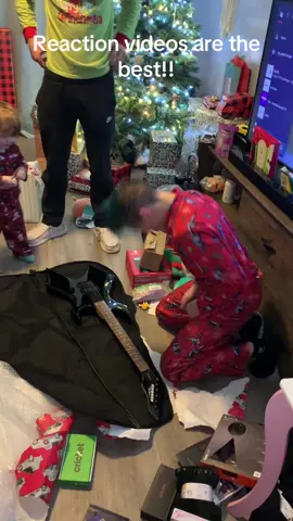 The best reaction video from our Christmas morning 🥰 #christmas #family #presents #guitar #fyp #teen #son 