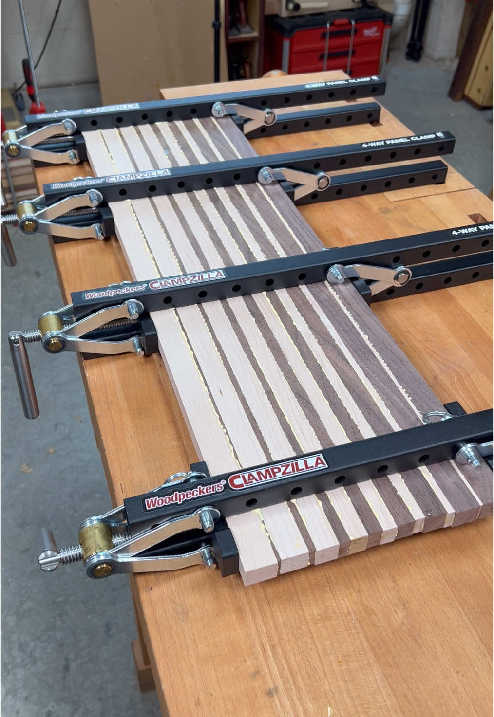 ClampZILLA 4-Way Panel Clamp 💪🏼 With these clamps, your glue-ups are sure to come out nice and flat. These clamps come in three different sizes… 18”, 38” and 50” and allow you to clamp material from 5/8” to 4” thick. The ones I used in the video were our 18” size, and they were perfect for these cutting boards I’m working on. The ClampZILLA ensures a perfectly flat panel by providing not only lateral pressure on the exact center of your panel, but also vertical pressure, which keeps the faces correctly aligned. The ClampZILLA is made in America, and built to last. The steel bars and clamping pads are powder-coated for a tough, long-lasting finish… dried glue easily pops right off. All the clamping mechanism components are machined from zinc-plated hardened steel, except the clamp screw pivot, which is machined from brass. All machining is done on state-of-the-art CNC equipment right here in our Strongsville, Ohio facility. If you’re interested in learning more about these, check them out over on our website at www.woodpeck.com or click the link in bio!  Tools Used: 1️⃣ CLAMPZILLA - 2022 - 50” Capacity - 4 Pack SKU: CLPZ-50-4-22 2️⃣ CLAMPZILLA - 2022 - 38” Capacity - 4 Pack SKU: CLPZ-38-4-22 3️⃣ CLAMPZILLA - 2022 - 18” Capacity - 4 Pack SKU: CLPZ-18-4-22 4️⃣ CLAMPZILLA - 2022 - 50” Capacity - Individual SKU: CLPZ-50-1-22 5️⃣ CLAMPZILLA - 2022 - 38” Capacity - Individual SKU: CLPZ-38-1-22 6️⃣ CLAMPZILLA - 2022 - 18” Capacity - Individual SKU: CLPZ-18-1-22 #woodworking #woodworker #woodworkingvideo #woodworkersofig #igwoodworkingcommunity #clamping #clamps #woodworkingclamps #clampzilla #woodpeckerstools #woodshop #woodworkingtools #woodworkingskills #ohiobusiness #maker #makersgonnamake #cuttingboard #glueup #titebond #satisfyingvideos #toolsofthetrade #madeinamerica #toolwatch