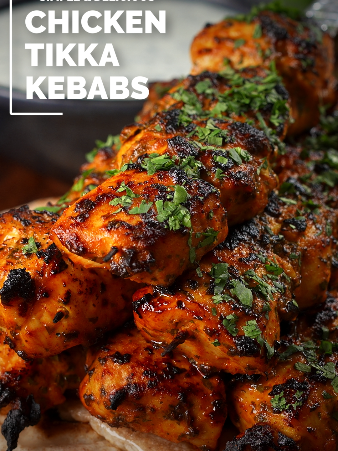 Chicken tikka kebab skewers in an Indian yoghurt marinade are perfect rolled in a chapati, served as a starter or stirred through a curry. I prefer to cook these Indian kebabs under the grill (broiler), but I also have instructions for the oven, air fryer and BBQ on my website. #chicken #chickenrecipe #chickenrecipes #tikka #kebabs #chickenkebabs #chickenkebab #cookingathometiktoktv #cookingtiktok #dinner #recipesoftiktok #Recipe #recipes #DinnerIdeas