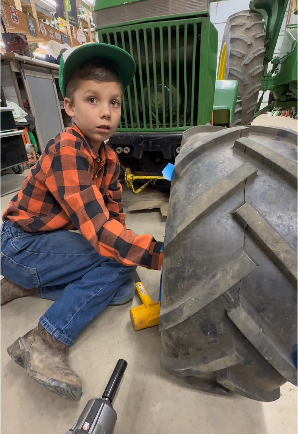 Jackson and I working together  on the hubs of his @John Deere #johndeere112 #justajacksonthing #countryboy #fyp #jacksonfarmer #makefarmingfun #oldschool #rockyboots #restore #gardentractor 