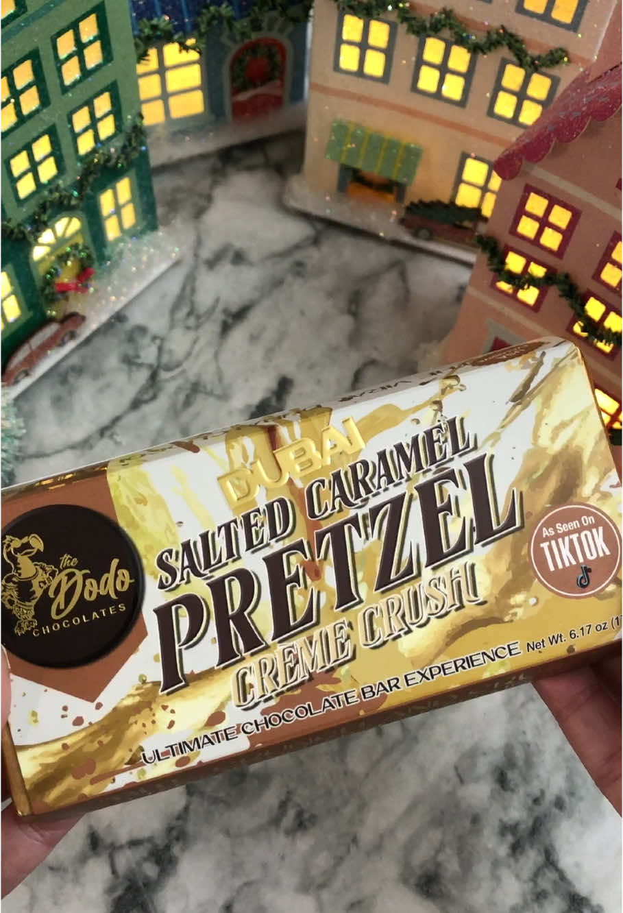 The Dodo Chocolates Dubai Salted Caramel Pretzel Crème Crush Chocolate Bar! 🍫 This bar features the perfect balance of creamy milk chocolate, crunchy pretzel pieces and a salted caramel filling.  So decadent and the    salty and sweet combo is perfection!  #gifted #chocolate #dubaichocolate #viral #viraldubaichocolate #candy #asmr #tastetest #foodreview #asmrfood #dubai #tiktokshopfinds #candytok @The Dodo Chocolates 