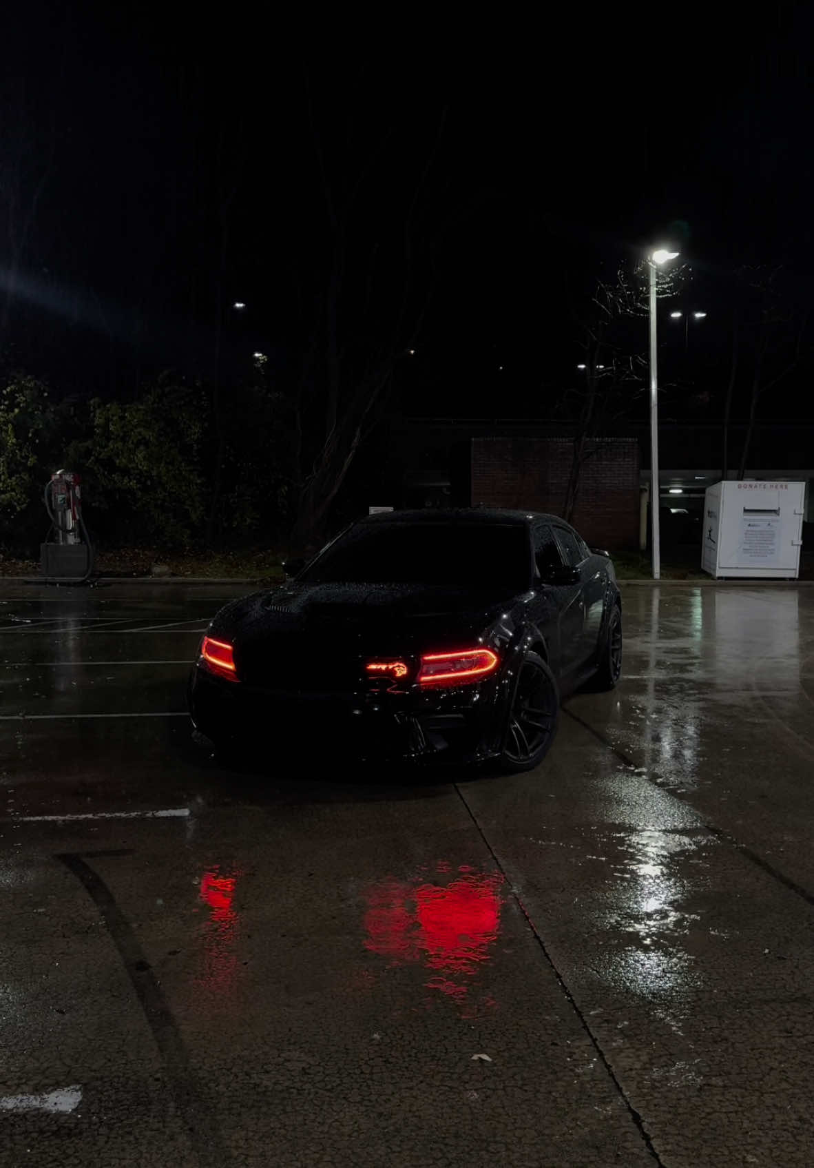 Blackest 🐈‍⬛ in rain #fyp #hellcat #srt #viral 