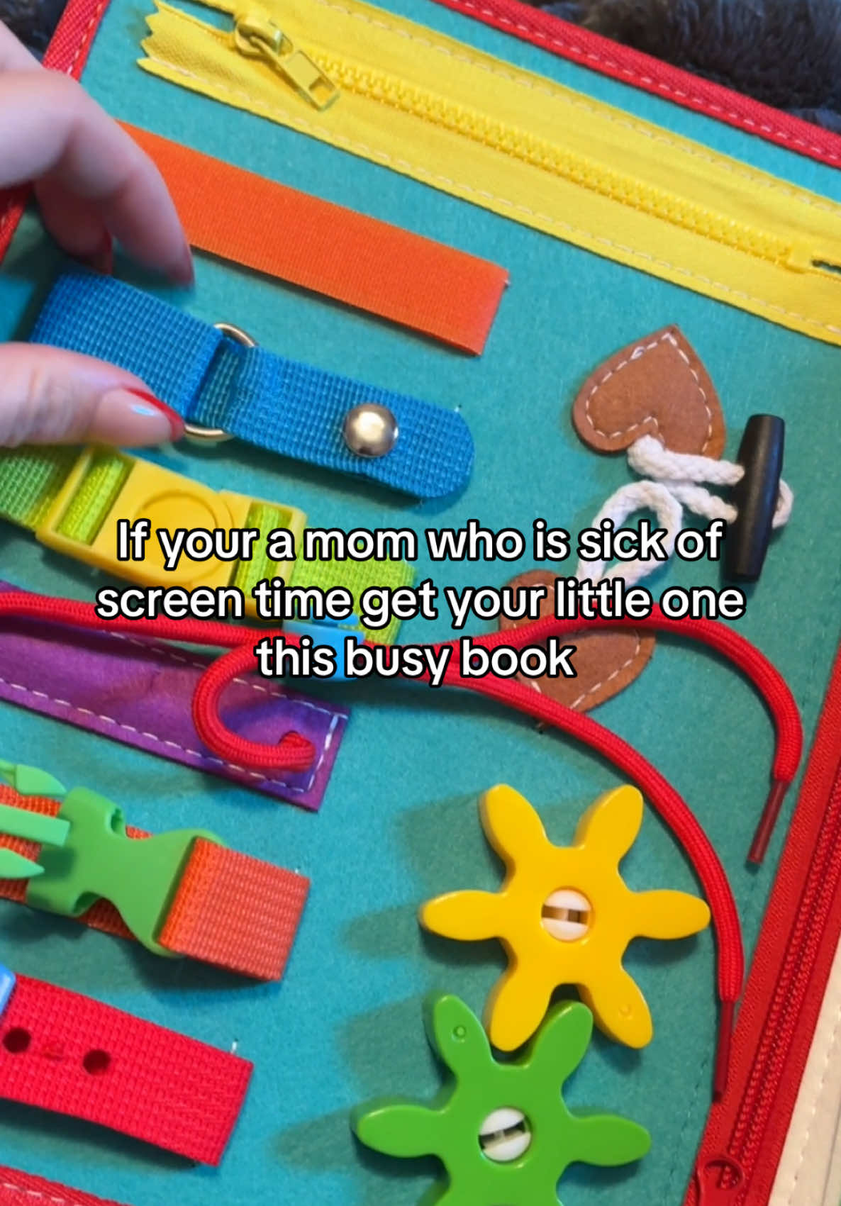 My toddler will play with this for hours! #toddler #toddlermom #toddlertoys #toys #busybook #toysforkids #momhack #busyboard #montessoritoddler #montessoriactivities 