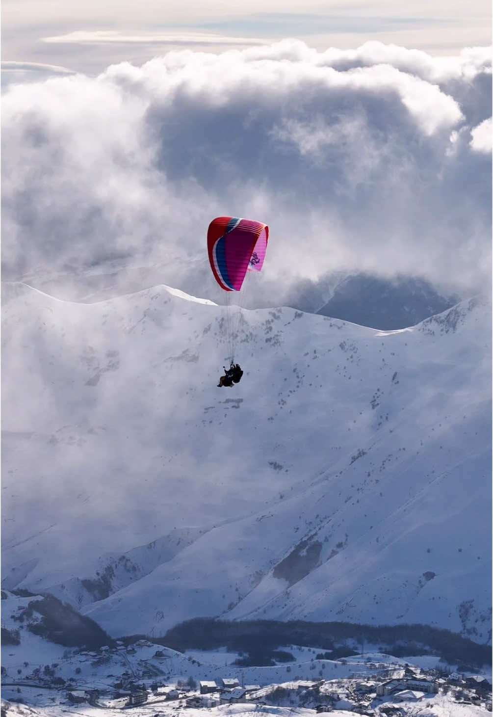 Paragliding in Gudauri🏔️🪂 • • (Georgia)🇬🇪 Friends, if you want to visit the beautiful Gudauri and fly on Paragliding or snowmobiles and  if you want a video from a drone - then write to me in private messages I will arrange everything for you🎬✅ #georgia #paragliding #winter #drone #world #gudauri #tbilisi #sport #beautiful #mountains #traveling #dji 