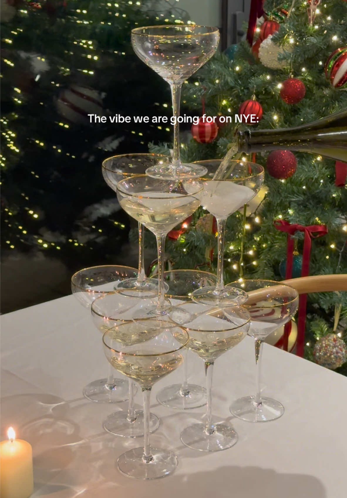 The most fun it can get is when you’re welcomed with a champagne/sparkling wine tower 🥂✨ #champagnetower #hosting #tablescapeideas #newyearseve #hostingtips  