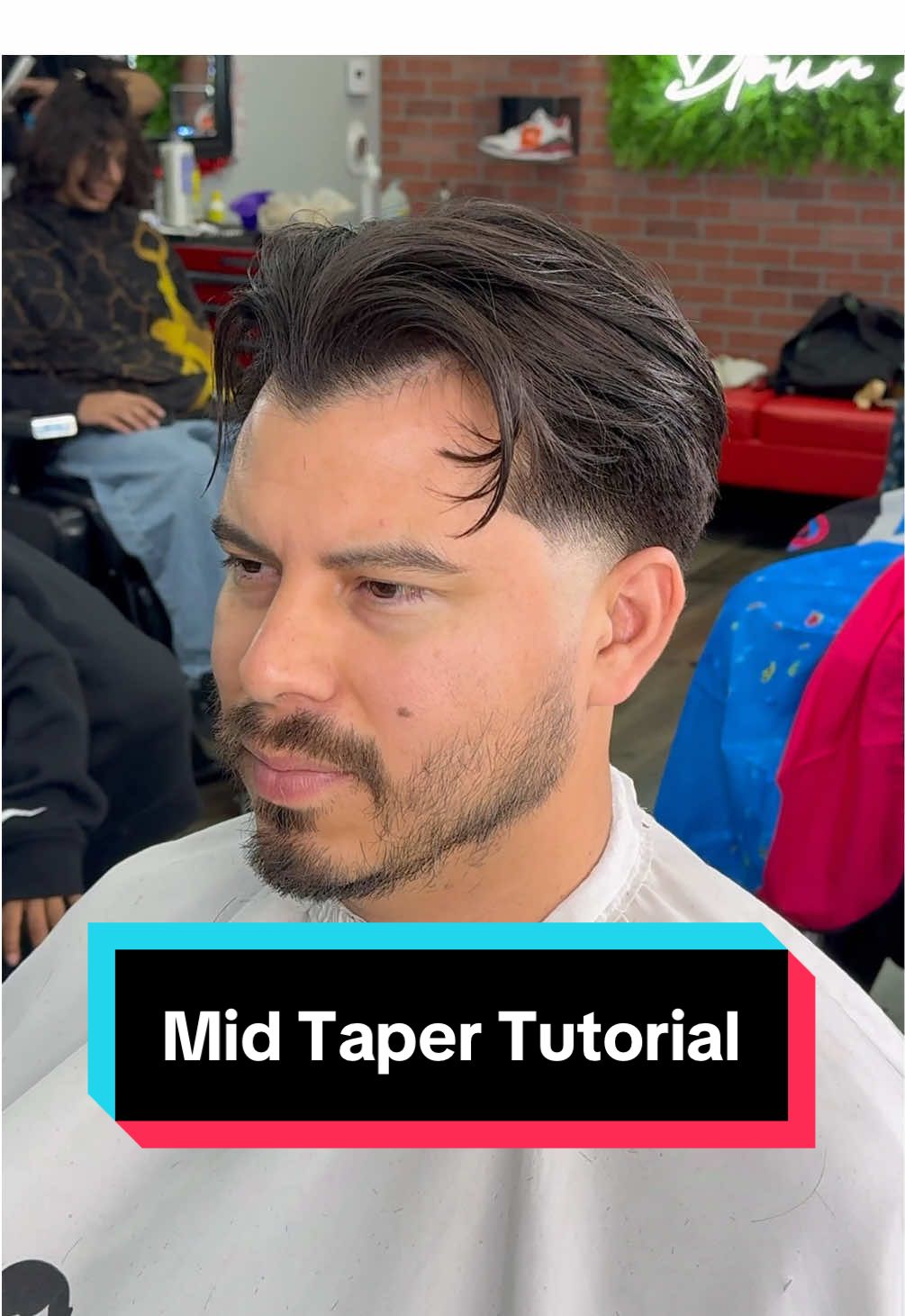 Mid Taper Fade The mid taper fade is perfect for this head shape. It allows for more darkness to show contrast to the fade. The brushback is a versatile haircut for straight hair. #iebarber #midtaper #taperfade #barbertutorial #haircuttutorial #inlandempire