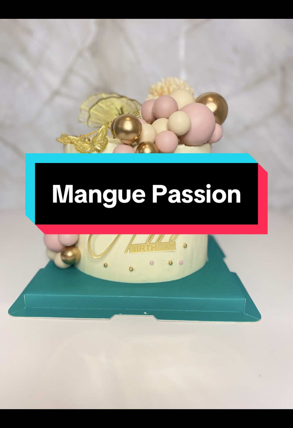 Mangue & passion. . Génoise, crémeux mangue, ganache montée mangue, fruits frais (mangue et passion) .  #gateau #happynewyear #mangue #cakedesigner #2025 #patisserie 