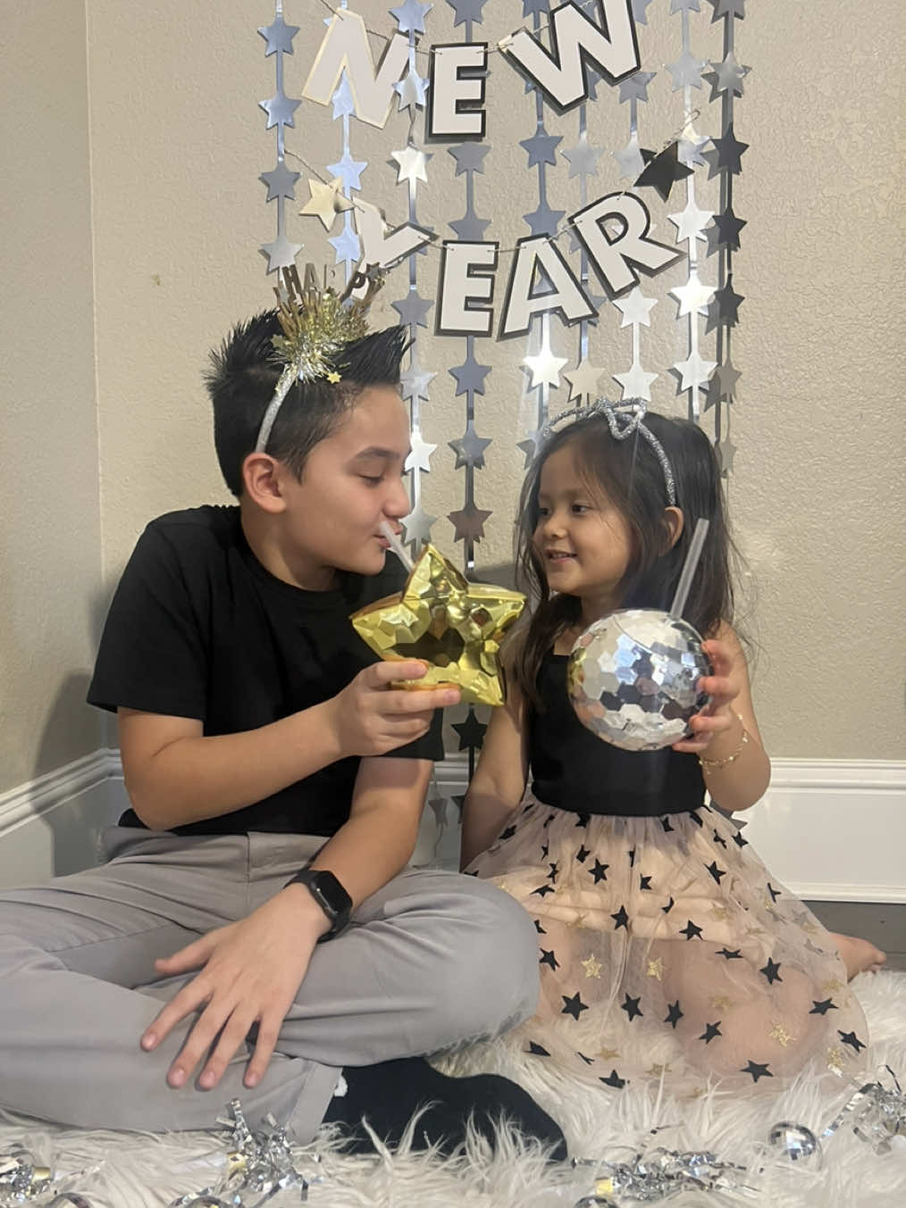 Happy New Year! 🖤🪩🌟✨ my favorite thing to do every year is take these photos & videos of these 2 🥰 #happynewyear #hello2025 #nye #traditions #fyp #bye2024 #january1st 