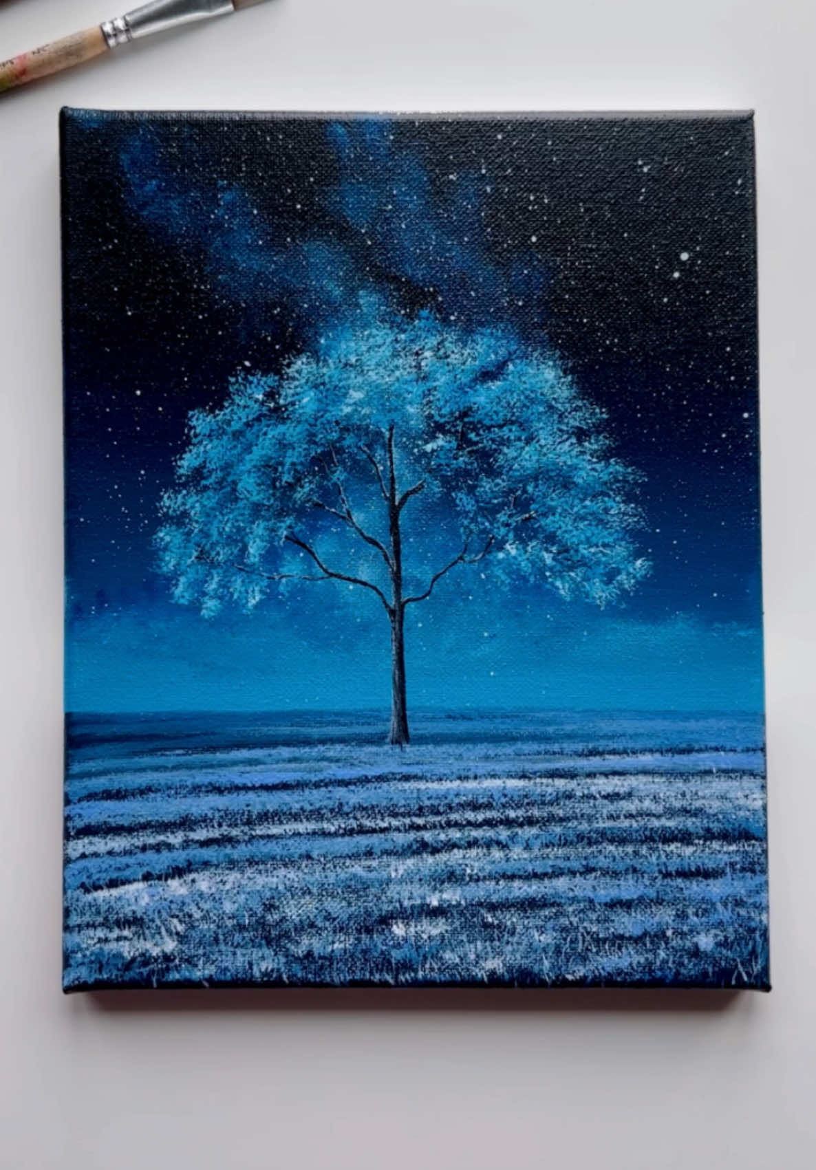 Serene Blue Tree Under a Starry Sky 💙🌌  -Happy New Year! Wishing you all love, joy, and success in 2025! ✨💖 . . . . . . . . . . . . . . . . . . . . . . . . . . . . . . . . . . . . . . . . . . . . . . . . . . . . . . . . . . . . . . . . . #easyart #canvaspainting #howtopaint #treepainting #starrysky #abminiart #rewards #creators #art #painting #acrylicpainting #artworks #artistoftiktok #artistsupportartist #wintervibes #christmasgift #traditionalart #fypageシ #foryouuuu #artok #artists #landscapepainting 