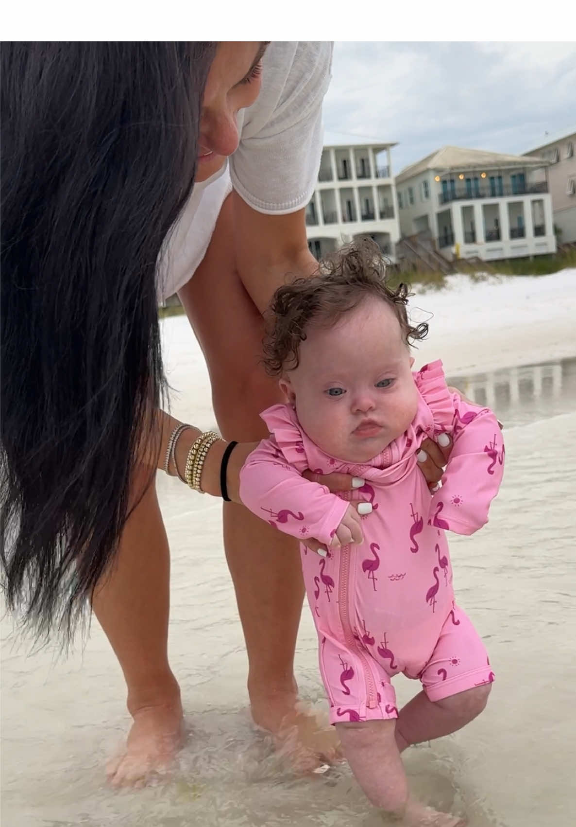 A favorite from 2024. Eloise was 5 months here. From the moment I found out I was pregnant… I dreamed about my little baby’s toes in the sand. Our family trips to the beach were my favorite part of my childhood. I hope she learns to love it just as much as I have. 💙 #theluckyfew #lucky #downsyndrome #downsyndromeawarenes #trisomy21 #trisomy21 #specialneeds #lifewitheloise #happygirl #smileygirl #beach