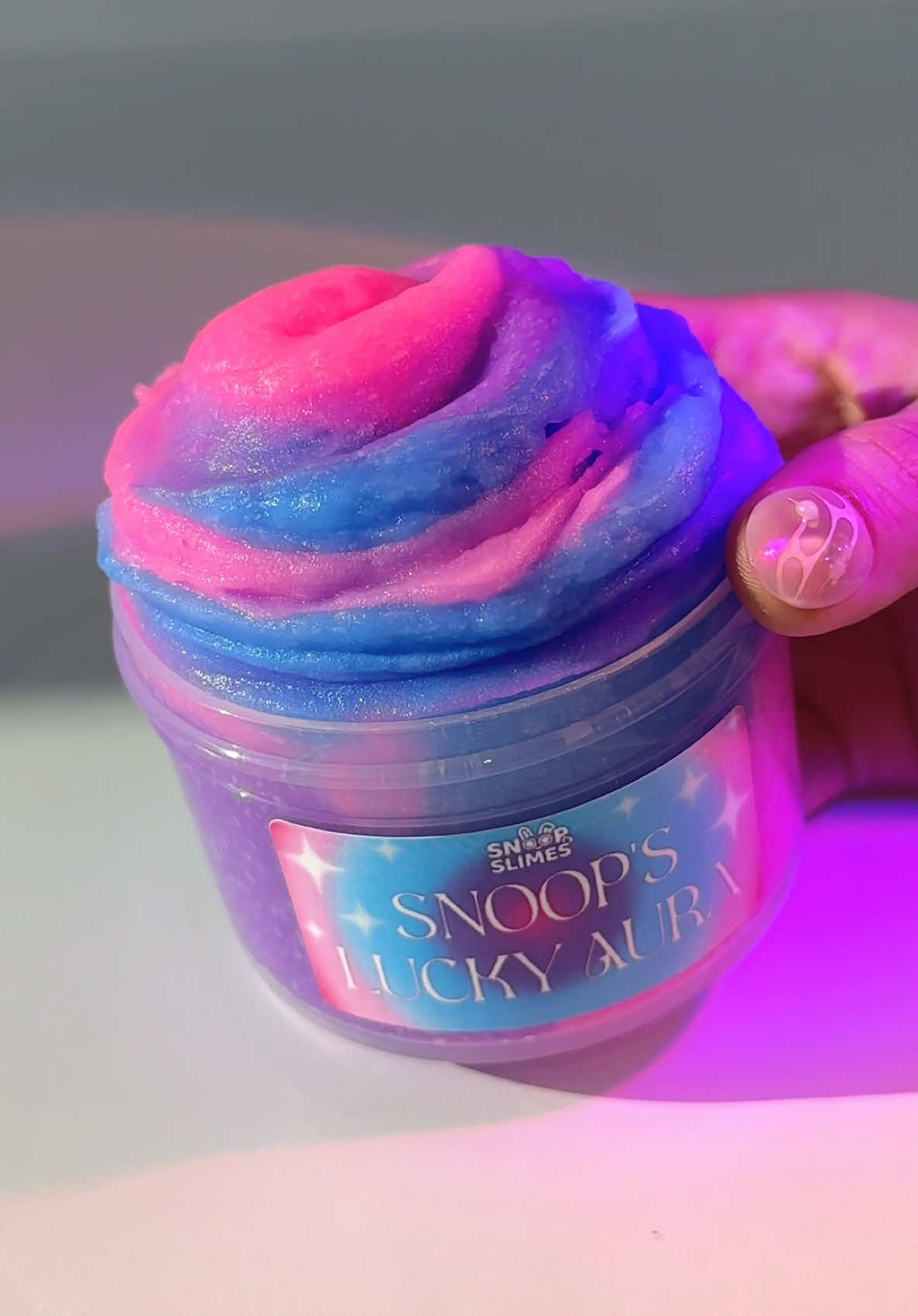 Snoop's Lucky Aura 💕 An icee slime that is sizzly and scented like tropical fruits + flowers! Stretch repeatedly to get a soft and fluffy icee slime texture #slime #asmr #sizzles 