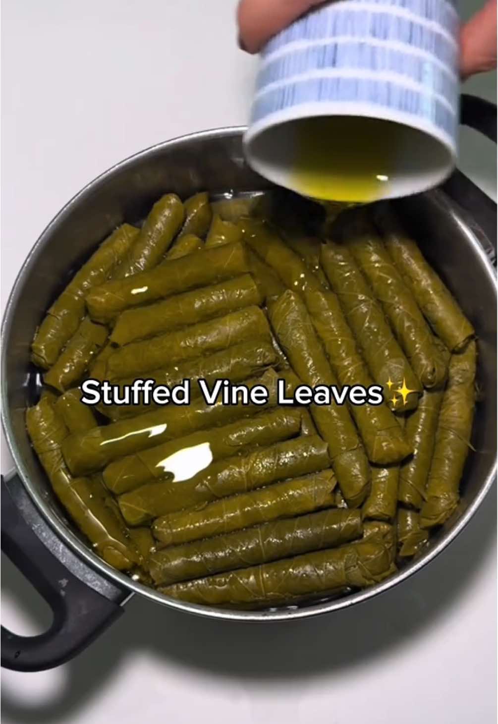 Turkish dolmas (stuffed vine leaves)✨ Read the description for the ingredients 🍇 Ingredients: 400 g grape leaves 1/2 cup olive oil 2 tablespoons pine nuts 2 onions 2 cups rice 1 teaspoon salt 1/2teaspoon black pepper 1teaspoon dried mint 1/2 teaspoon allspice 1/2 teaspoon cinnamon 2 cups of water 1 tablespoon currants 1tablespoon pomegranate molasses For Cooking: 2 cups of water 1/2 cup olive oil #food #foodies #stuffedvineleaves #dolmas #turkishcuisine #recipes #DinnerIdeas #meze #fyp #viral 