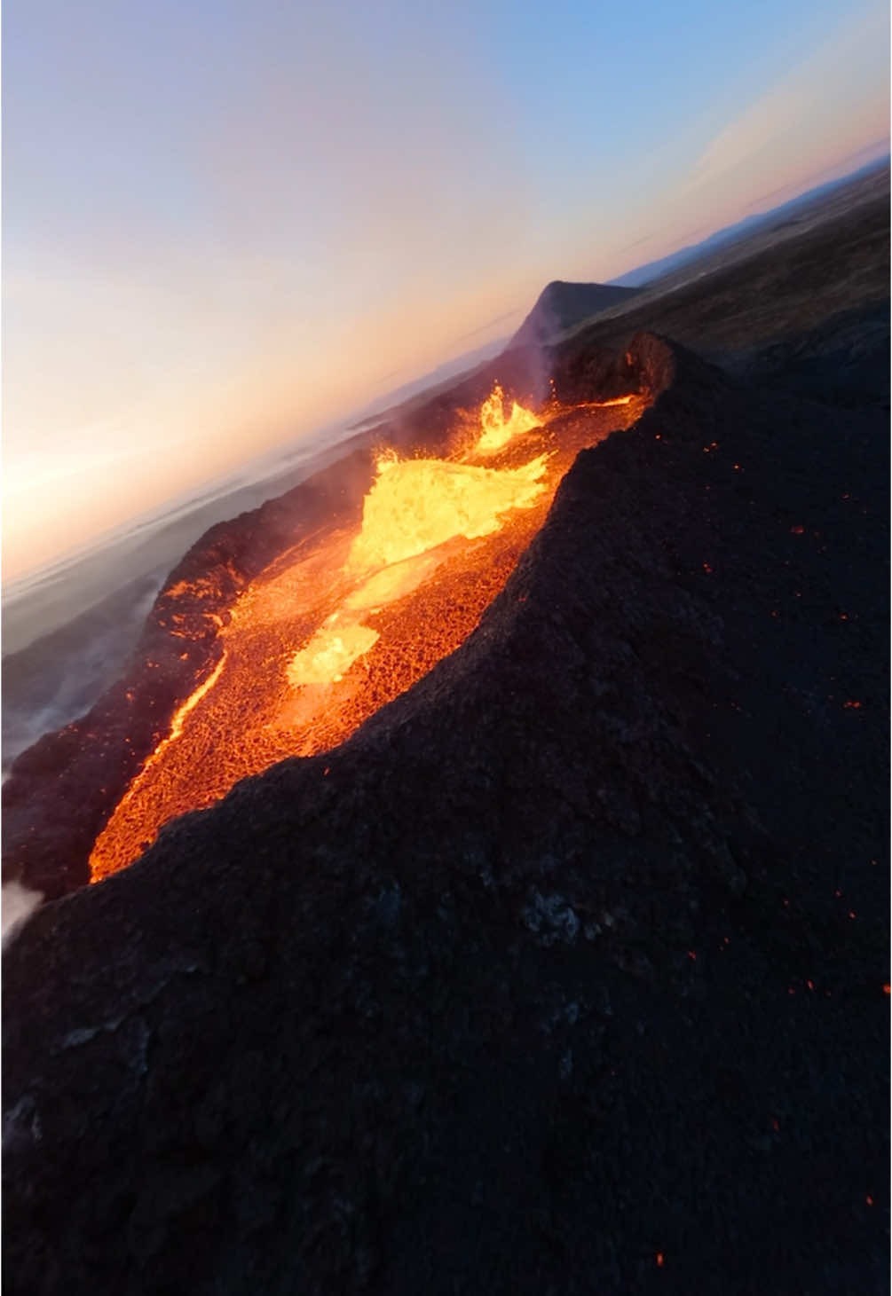 The lava flew right into my camera 😰 I wasn’t too upset about losing the drone—I knew the risks of flying into an active volcano 🌋 What worries me more is the environmental impact 🚁 If a LiPo battery dissolves in water, it’s a real problem 🔋 Luckily, the volcano probably burned it to ashes in seconds 🔥 The tiny bit of pollutants in the air is nothing compared to what the volcano emits anyway 😅 Honestly, I’ve never felt better about losing a drone 😂