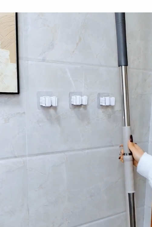 Install two mop clips like this in the bathroom, which makes cleaning convenient and does not take up space behind the door #MopClip #StorageOrganization