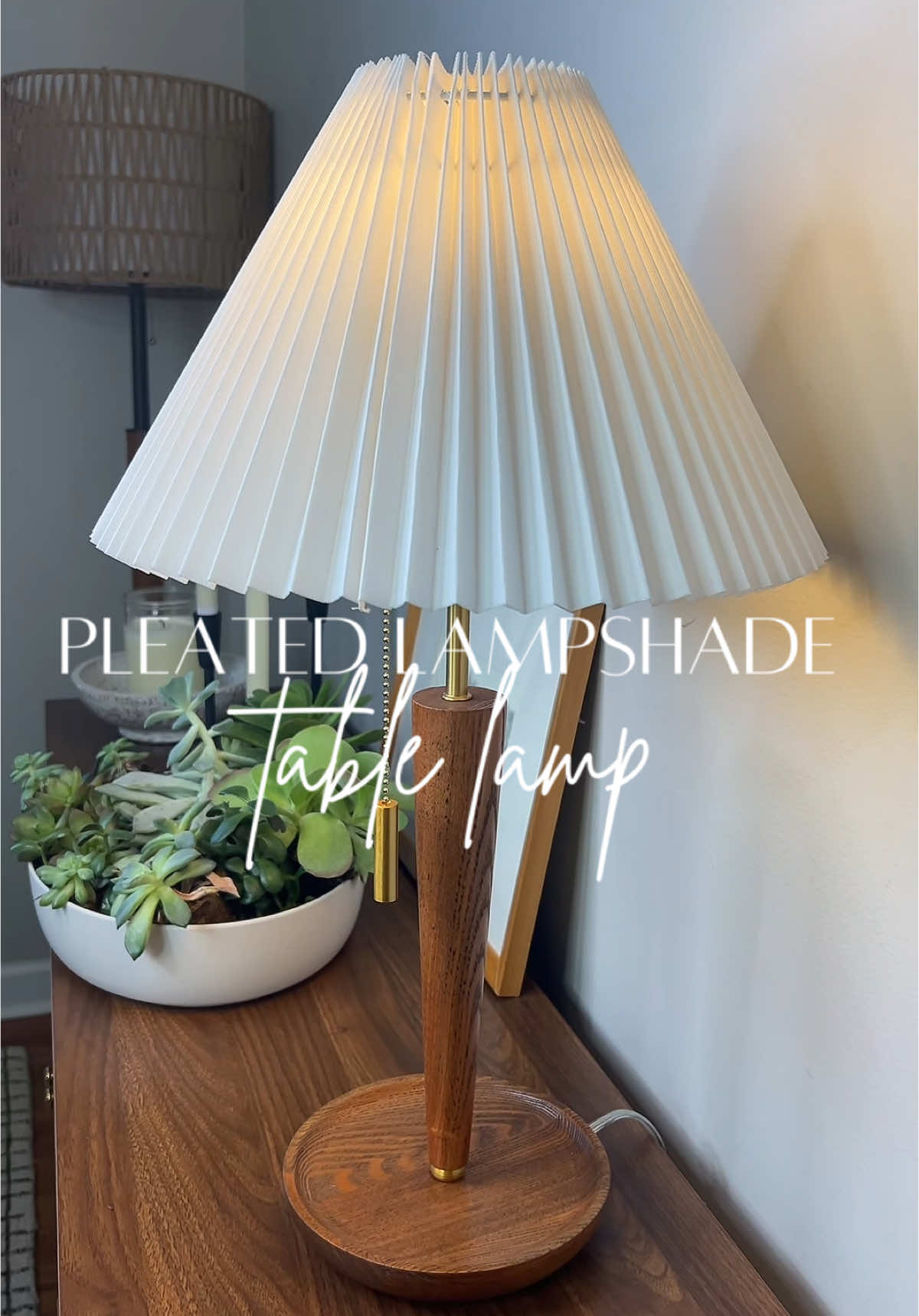 One of the PRETTIEST pleated lampshade table lamps I’ve come across! So warm, modern and gorgeous! Linked by the cart at the bottom. #lamp #lamps #tablelamp #pleated #pleatedlampshade #pleatedlampshades #modern #moderndecor #modernhome #modernhomedecor #retro #retrovibes #bedsidetable #tablelamps #endtabledecor #endtables #light #lights #lighting #tts #tikokshop #tiktokshopfinds @Safavieh 