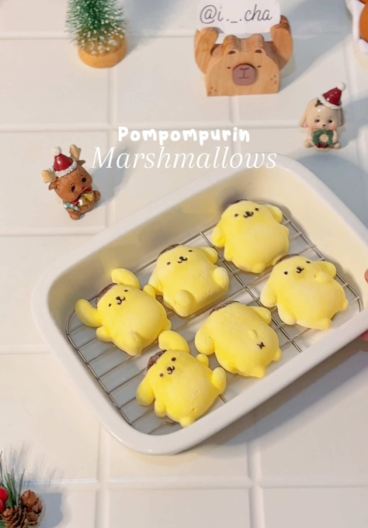 pompompurin marshmallows! ✨ i made my own marshmallows as store bought ones are too boring 🌝 previously i’ve made hello kitty marshmallows, and this time, it is pompompurin, my favorite sanrio character😆💖 ingredients: group A: 35g egg white 20g sugar prep-steps: — whip the egg white and sugar until foamy and reached medium peak  group B: 30g water 100g sugar 20g corn syrup 15g gelatine + 30g water steps: — mix all ingredients in group B in a pot, stir well until boiling. turn off the heat and add in the bloomed gelatine. stir once again until mixed thoroughly. — while hot, pour the mixture to the whipped egg white and sugar (from group A). whip all of them again using mixer for 2mins or until well combined. — divide the marshmallow mixture into several parts and give them each food colouring. if the mixture starts to harden, you can melt it again using double boiler/microwave. — pour in the mixture to the oil-covered mould. let it set in the freezer for an hour. — take the marshmallows out carefully and toss them around on the roasted corn starch. make sure all surfaces are covered with the starch. — after 5mins, remove the excess starch by brushing them off. — enjoy! — @i._.cha  ❕please do not repost my videos without permission.  #homecafe #homecafé #homecooking #homebaking #homebaker #coquette #bakeathome #cutefood #hellokitty #marshmallow #pompompurin