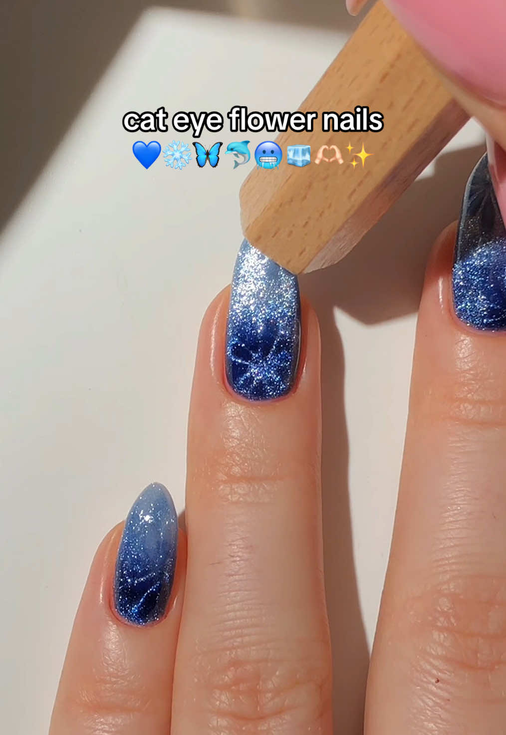 cat eye flower nails! 💙❄️☃️ a winter-y flower nail design that i’d imagine seeing on Elsa’s nails in Frozen! <3 — using: • @melodysusie  cat eye gel polish “Galaxy Blue” 💙 cat eye gel polish “Aquamarine Blue” 🩵 7-in-1 builder gel “Milky White” 🤍 gel top coat ✨ (use my code paular12 for 12% off! 💸) • the magnet i used is from amazon! 🧲 *paid to create #winternails #frozennails #cateyenails #nailarttutorial #nailinspo #naildesign #diynails #gelnails #nails2inspire #fypシ゚ 