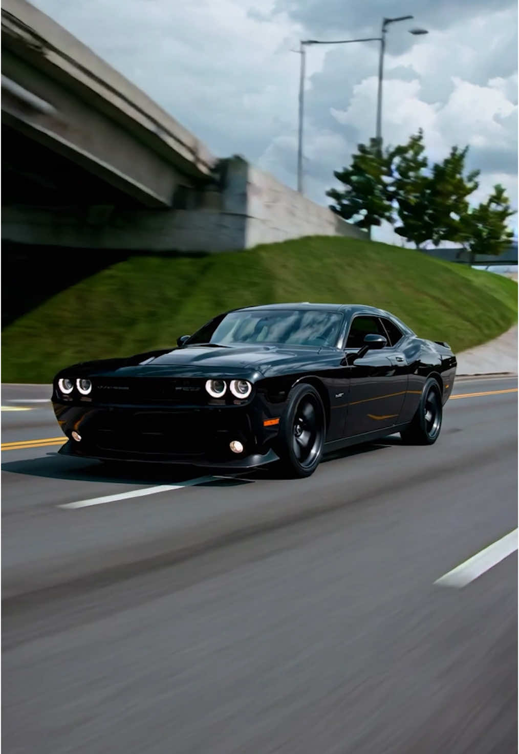 Black Dodge Challenger is a beast.  #ai #viral_video #sora #automotive #viralai #dodgecharger #americancar #increible 