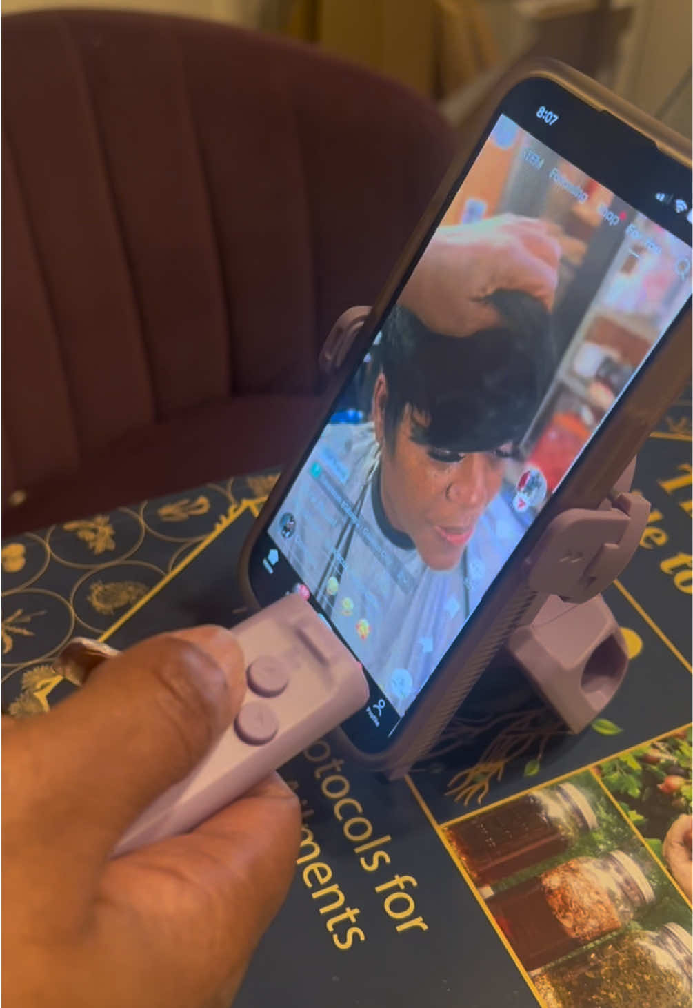 This is the dopest gadget on the tiktok shop right now. A remote and stand that lets you scroll tik tok #TikTokShop #trendygadgets #trendyproducts #gadgets #remotecontrol #phonestand 