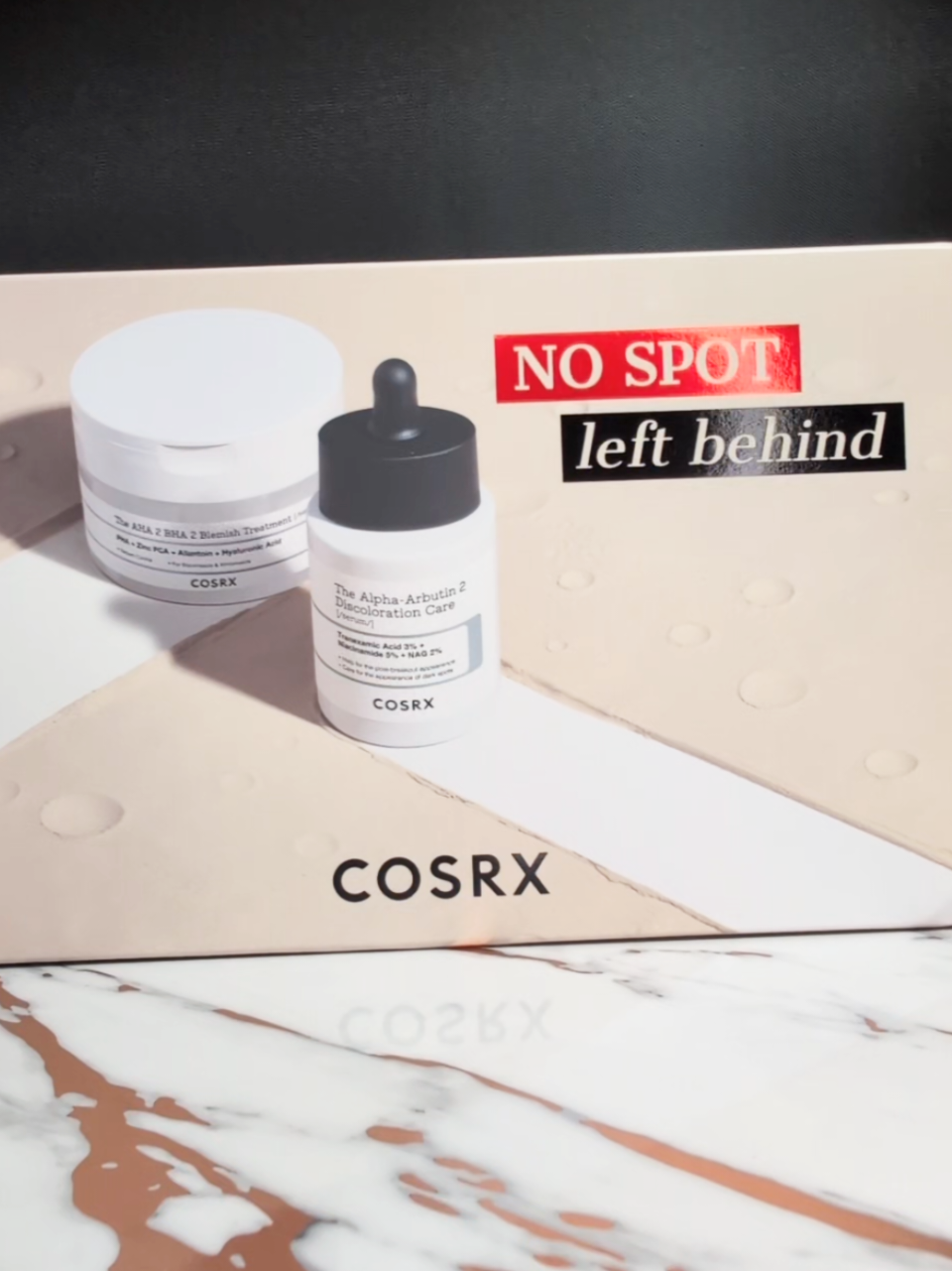 Unboxing the new No Spot Left Behind kit from COSRX. This includes the The Alpha-Arbutin 2 Discoloration Care Serum and The AHA 2 BHA 2 Blemish Treatment Serum. I'm a huge fan of COSRX and I'm really looking forward to seeing the full results of both products! ✨The Alpha-Arbutin 2 Discoloration Care Serum: a high-potency serum with anti-melanin active ingredients like Alpha Arbutin, Tranexamic Acid, and Niacinamide, effectively addressing every stage of hyperpigmentation while soothing irritation and providing hydration. ✨The AHA 2 BHA 2 Blemish Treatment Serum: Highly concentrated with 2% AHA and 2% BHA, it quickly and easily soothes acne-scarred skin and instantly cares for blackheads and whiteheads. 🛍️Get both at Ulta Beauty today! (storefront in my linktree) https://creatorsold.io/ulta-beauty/jaaaaaaaaaaaaaac @COSRX Official @COSRX US @Ulta Beauty #COSRX #NoSpotLeftBehind #unboxing #unboxingvideo #gifted_by_cosrx #fyp #foryoupage #productreview #skincareyouneed #SkinTok #kbeauty #skincaretips #alphaarbutin #viral #skinfluencer #ugc #foryoupage #skincare #serum #niacinamide #darkspots #hyperpigmentation #consciousbeauty #acnescars #melasma #UBAffiliate #commissionsearned #ultabeauty