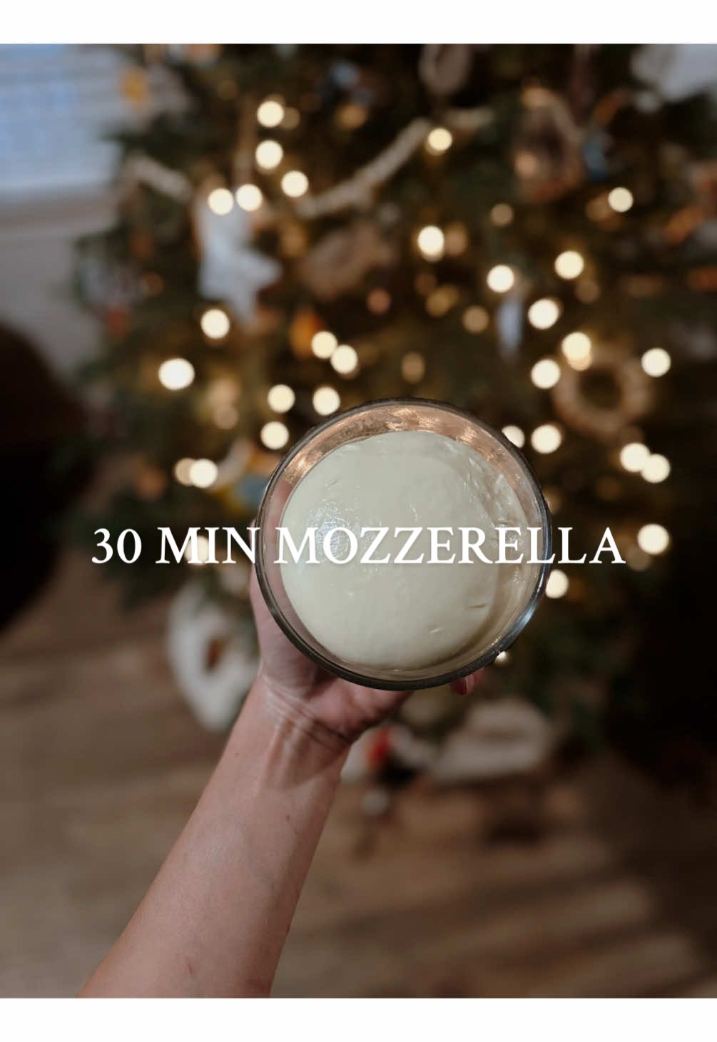 Make fresh homemade mozzarella in just 30 minutes!  Prep Ingredients: Dissolve 1.5 tsp citric acid in 1 cup cool water. Dissolve 1/4 rennet tablet (or 1/4 tsp liquid rennet) in 1/4 cup cool, non-chlorinated water. Mix Milk and Citric Acid: Pour 1 gallon of cold, non-ultra-pasteurized milk (I did raw milk) into a pot. Stir in the citric acid solution. Heat Milk: Slowly heat the milk to 90°F (32°C), stirring gently. Add Rennet: Remove from heat and gently stir in the rennet solution for 30 seconds. Cover the pot and let it sit undisturbed for 5 minutes until curds form. Cut and Cook Curds: Cut the curds into 1-inch cubes. Heat the curds to 105°F (40°C) while stirring gently. Drain Whey: Transfer the curds to a colander to drain off the whey. Heat and Stretch Curds: Heat the curds in a microwave for 1 minute, or place them in hot (175°F/80°C) water until they reach 135°F (57°C). Wearing gloves, stretch and fold the curds until smooth and elastic. I microwave 3x. First time for salt.  Sprinkle with 1 tsp cheese salt (adjust to taste) during stretching. And then 2nd time to stretch. And last time to get that final shape!  Shape and Cool: Form the cheese into a ball. optional: place it in ice water for 5-10 minutes to set the shape. I don’t if putting into container. It will hold its shape!  Enjoy & save for later 🧀#mozzarella  