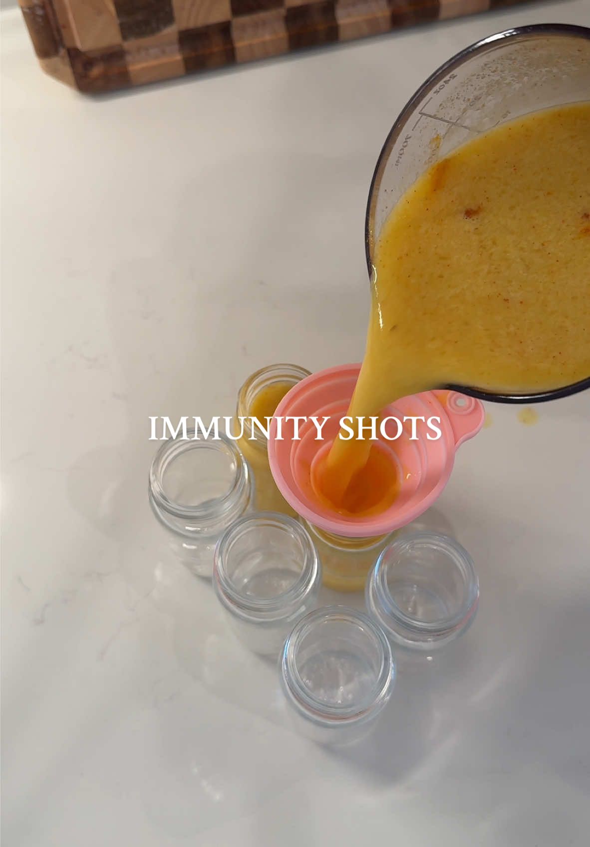 making my own ginger immunity shots 🍋🫚🧡✨ 1 orange, 3 lemons, 2 knobs of ginger, cayenne & turmeric! #asmr #asmrsounds #wellnessshots #gingershots #healthy #juicing #satisfyingvideo #organizedhome #aesthetic 