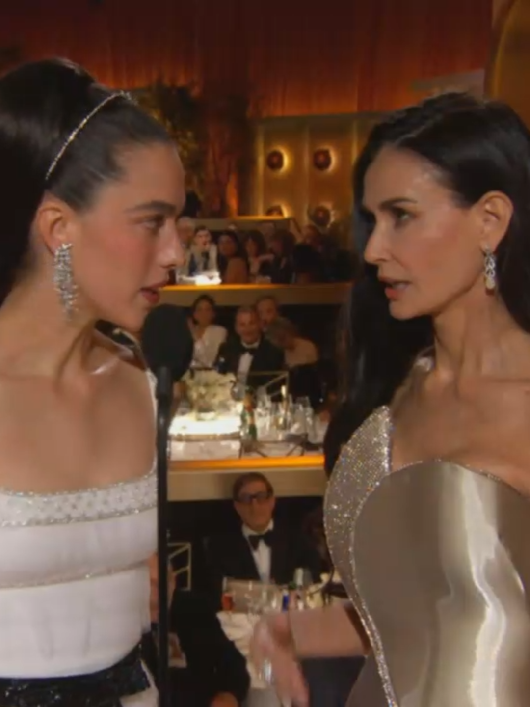 Demi Moore and Margaret Qualley do a #TheSubstance-inspired bit at the #GoldenGlobes.