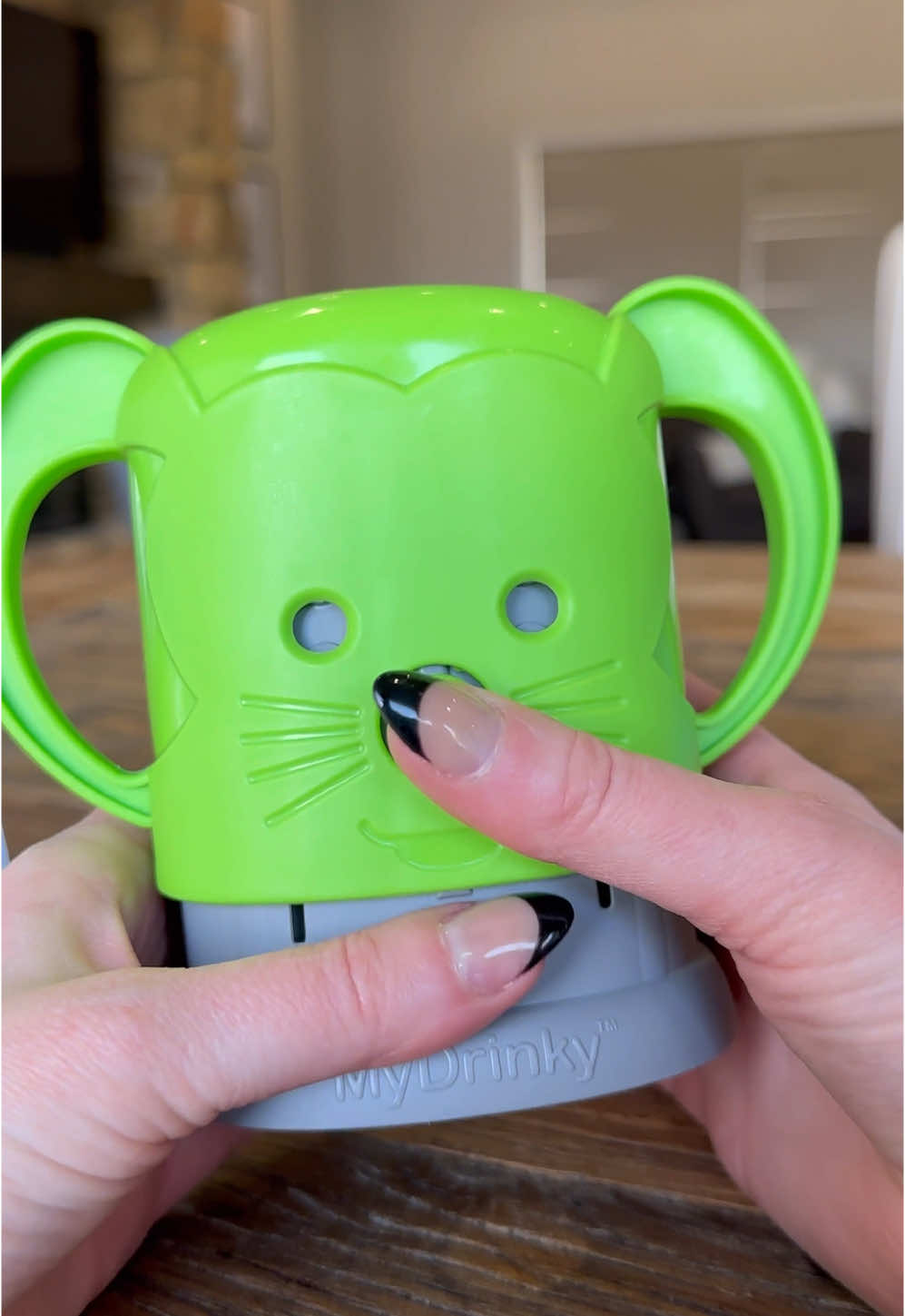 Say goodbye to messy spills with this adjustable drink holder. It fits juice boxes, pouches, and small bottles, locking them securely in place to prevent accidents, even with little hands squeezing.  Dishwasher safe and perfect for home or travel, it’s a must-have for busy families.  SAVE for later and SHARE with someone who would love this! #toddlermom #babyproducts #MomsofTikTok 