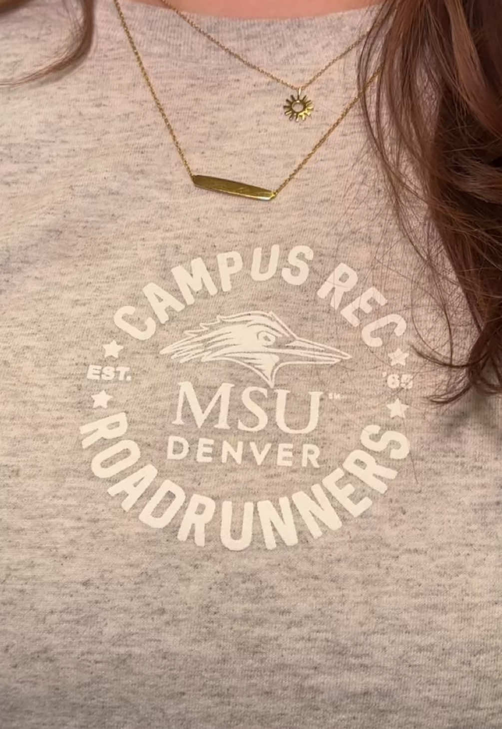 fr tho.. love our uniforms😌 #doyouworkhere #msudenver #campusrec #trending #fypシ゚viral #fy #commuterlife (Video Description: Opens with member waving then cuts to confused employee standing in gym with spray bottle and rag with a close up shot of logo on employees shirt then to the spray bottle then to the rag and ends with employee shrugging)