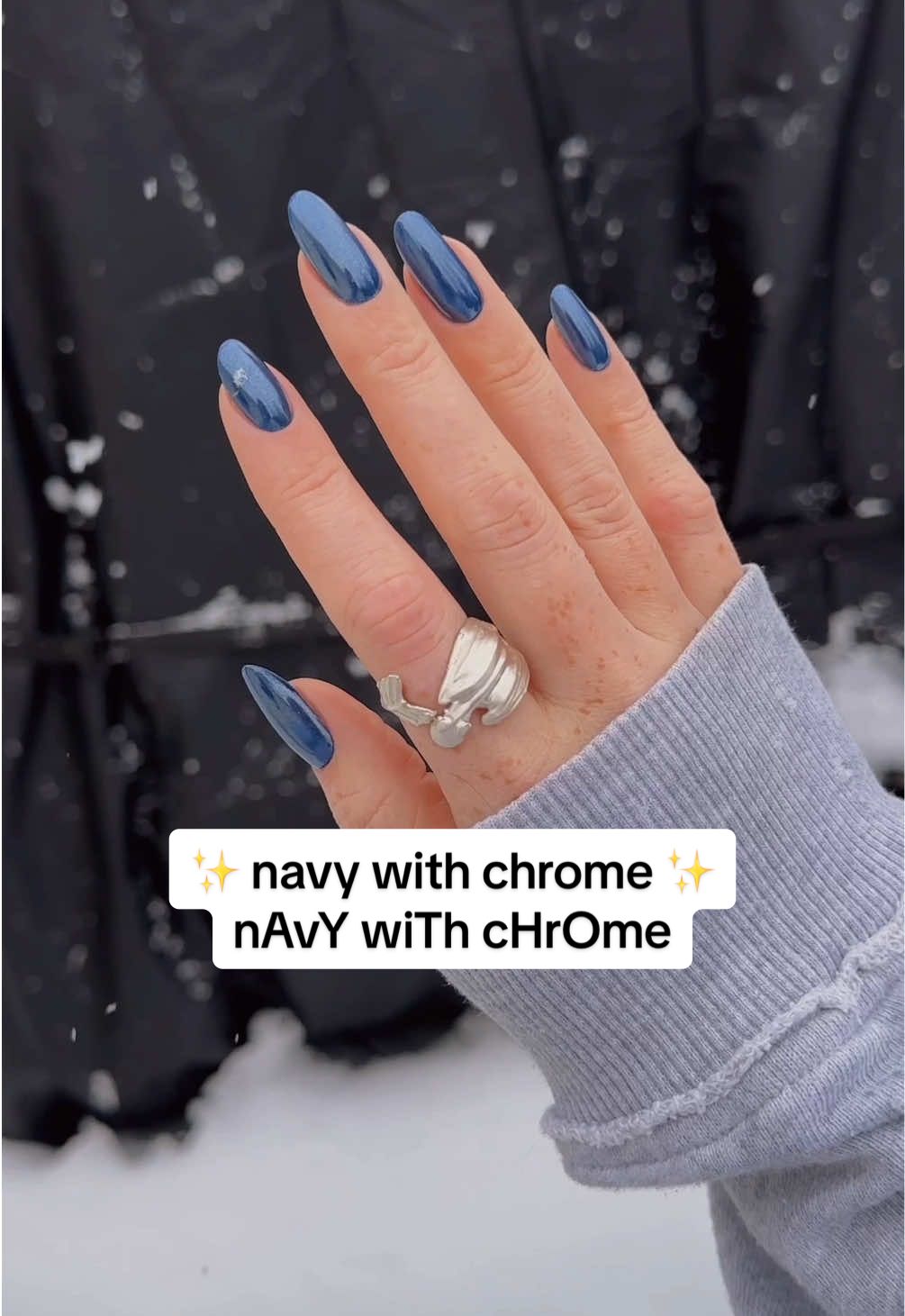 tHis is nOt a tUToRial 😉❄️💅🏻✨ #navywithchrome #nailart #chromenails #easynails #nails #diynails #dndgel #winternails #nailtrends #nailinspo  navy chrome nails  dnd gel polish  diy nails at home  winter nails  January nail trends - Paint your gel color, getting none on the skin, cure for the recommended times at the recommended wattage etc etc  - Add a thin layer of topcoat, cure for half the recommended time (in my case that was 30 seconds)  - Take a small amount of chrome powder on an applicator or with a gloved finger (bc we don’t want to touch particularly cured or uncured gel!) and gently rub it into the nail  - brush off the excess with a fluffy brush  - add another layer of topcoat and cure fully in the big lamp  - Spray fingers with ispropuk alcohol and use a stiff bristle enrich to remove exes powder  - Add cuticle oil to fix the dryness caused by alcohol  - Show your nails to everyone bc they’re so shinyyyyyy  -  -  - 🛒  @dndgel  White Chrome Powder: https://dndgel.com/products/dnd-chrome-effect-white-silk?_pos=6&_sid=543194dea&_ss=r 🛒 in stock here: https://nailcompany.com/products/dnd-chrome-effect-02-white-silk?variant 🛒 https://shopnailink.com/products/dnd-chrome-effect-white-silk-02? ❄️  @dndgel  