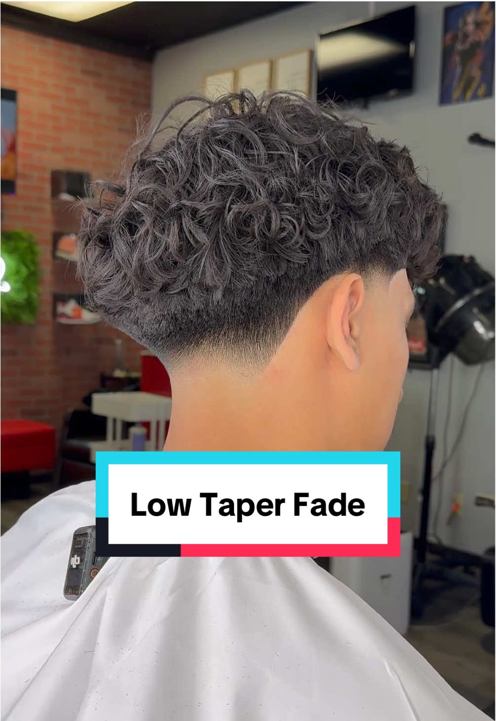 Low Taper Fade 😮‍💨 The low taper fade is perfect for this head shape. It allows for more darkness to show contrast to the fade. The blowout taper adds shape to the head. #iebarber #lowfade #midtaper #lowtaperfade #straighthair #dropfade #lowtaper