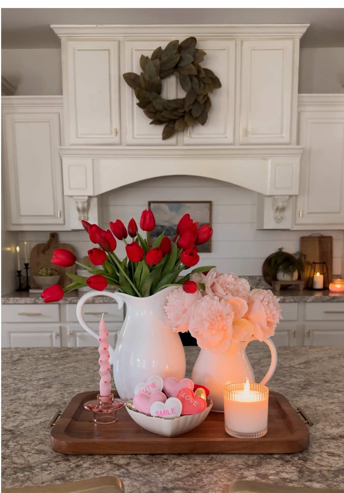 Valentines centerpiece idea!! ❤️ I love incorporating pink into my decor. I did a mix of red and pink flowers. I found the little cloth hearts and the heart bowl at target and I’m obsessed! I thought they were so cute! ❤️ Do you decorate for Valentine’s Day?? I’ll probably just do a few little things in my kitchen but not the whole house.❤️❤️ #valentinesdecor #vdaydecor #valentinesdaydecor #ValentinesDay #valentines #vday #homeinspo #homedecor #centerpieceidea #kitchendecor 