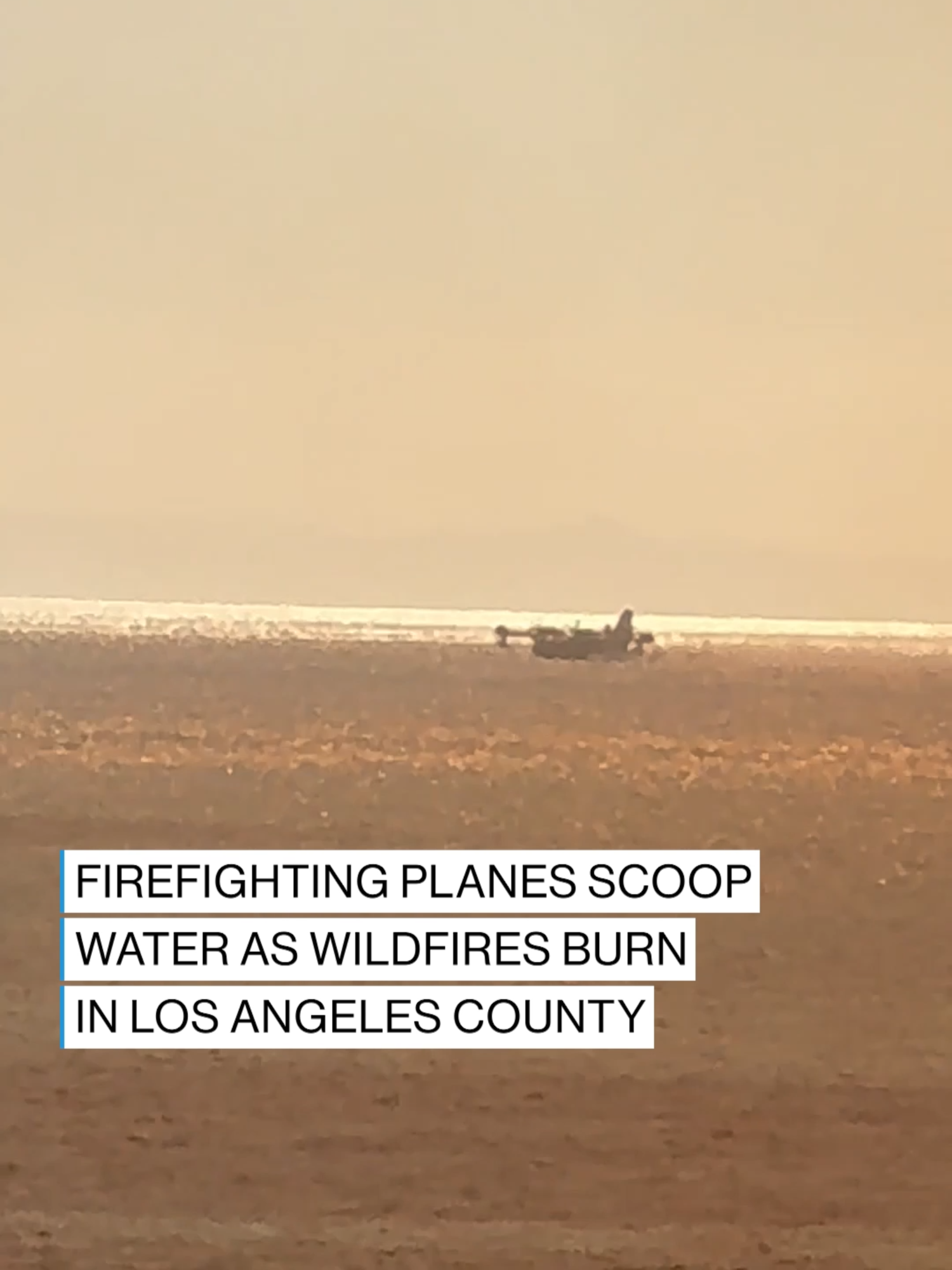 Bystander footage captures firefighting planes picking up water from the Pacific Ocean and flying over homes in Los Angeles in an effort to battle wildfires raging in California. #news #abcnews