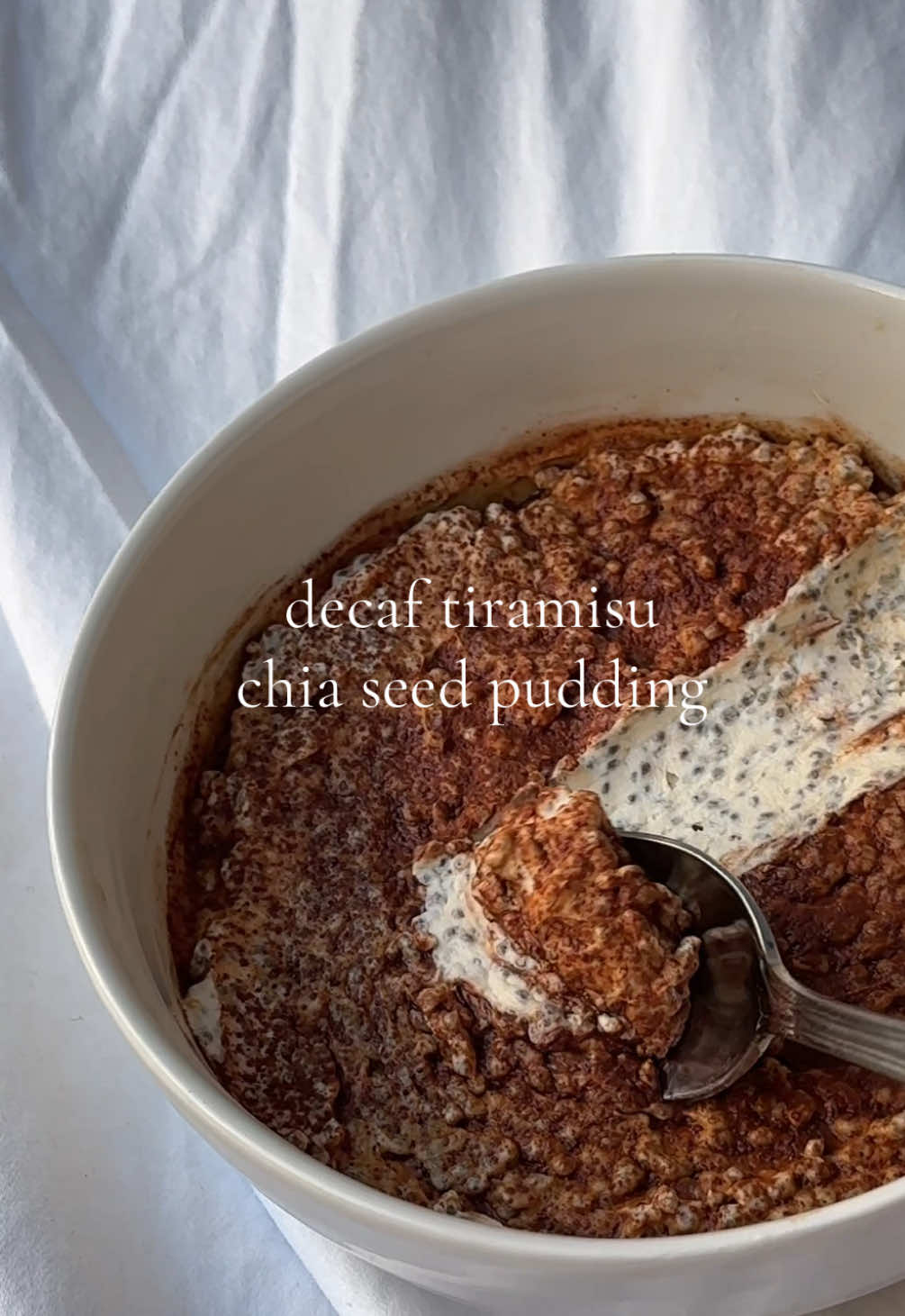 Decaf Tiramisu Chia Seed Pudding Recipe: 🤩🥣🤎 ⭐️205 Calories ⭐️21g of Protein Ingredients: -3/4 Cup of Greek Yogurt -1/4 Package of Sugar Free Vanilla Pudding Mix (optional) -1 Tbsp of Sugar Free Maple Syrup (can use regular) -2 Tbsp of Chia Seeds -1/3 Cup of @stokcoldbrew Decaf Cold Brew -1 Tsp Hershey Cocoa Powder Let it sit in your fridge for  5-8 hours before eating for best results! #chiaseedpudding #chiaseeds #breakfastideas #tiramisu #tiramisuchiapudding #chiaseed #chiapudding #highprotein #lowcalorie #yogurtbowl #fatloss #diet 