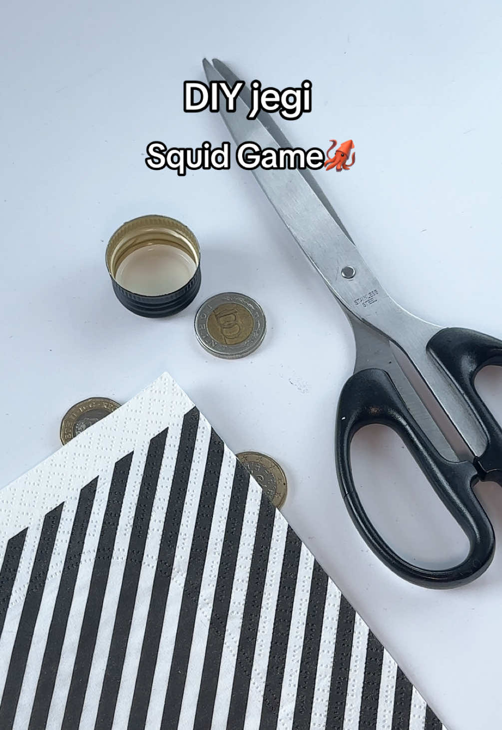 How to Make Jegi for the Jegichagi from Squid Game 🦑  You only need a napkin, a bottle cap, coins, rubber bands, and scissors. Let’s play Jegichagi! 🟢✂️ #SquidGameDIY #JegiDIY #Jegichagi #diysquidgame #SquidGameChallenge #DIYGames #GameNightIdeas #HandmadeGames #SquidGameInspired #SquidGameNetflix #DIYCrafts #SquidGames #squidcraftgames2 #squidgame #easydiy #diygift #diygiftideas #squidgamenetflix #squidgamegonggi top squid games #ddakji #diysquidgame 380 squid game 2 #squidgame2 player 246 x player 120