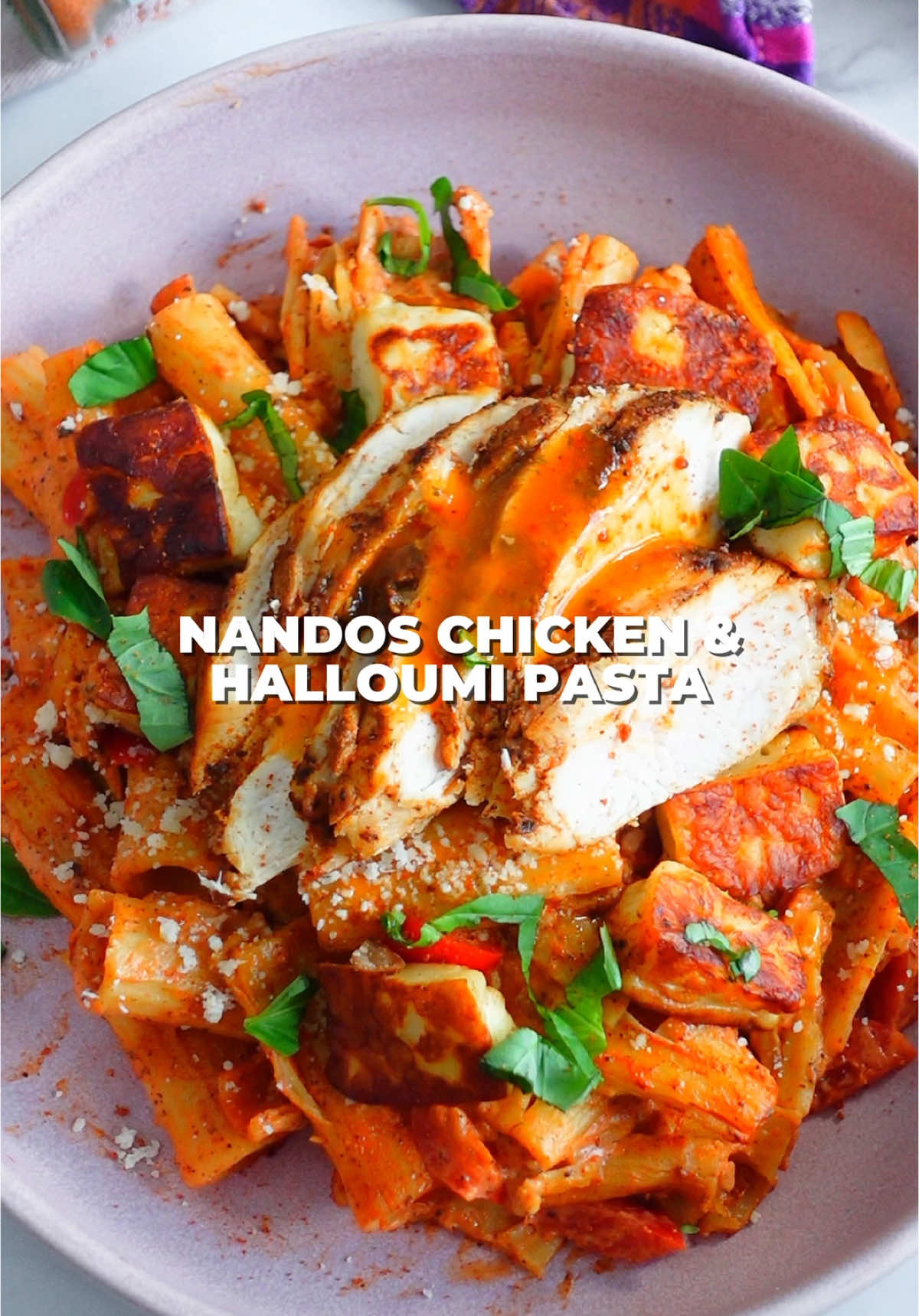 Nando’s chicken & halloumi pasta! 🐔🍝 One of my favourite pasta recipes! Recipe below: Ingredients (serves 4): - 1 block halloumi (cut into chunks)  - 2 large chicken breasts  - 400g rigatoni  - @Nando’s UK & Ireland sauce (whatever your favourite one is) - Nandos peri-peri salt - 3 garlic cloves  - Veg of choice (I used red bell peppers, but you can also stir through spinach, onions etc) - 250ml double cream or 200g cream cheese #nandos #nandospasta #fakeaway #pasta #pastarecipe #EasyRecipe #EasyRecipes #DinnerIdeas