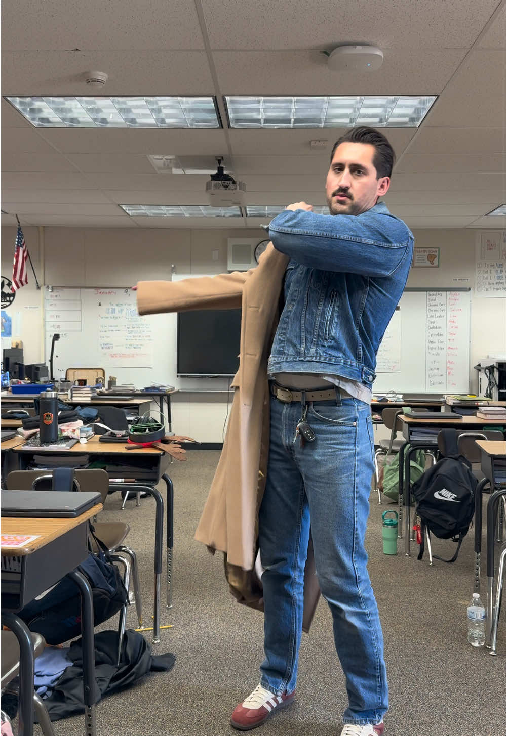 It was like 42 degrees outside in the morning today and that’s cold to me so I wore layers. Is that cold enough for this huge overcoat? Probably not, but I have it and don’t get to wear it much so I wore it. #vintagefashion #mensfashion #outfitinspo #teachersoftiktok #teacherootd #fyp #doubledenim #outfitideas 